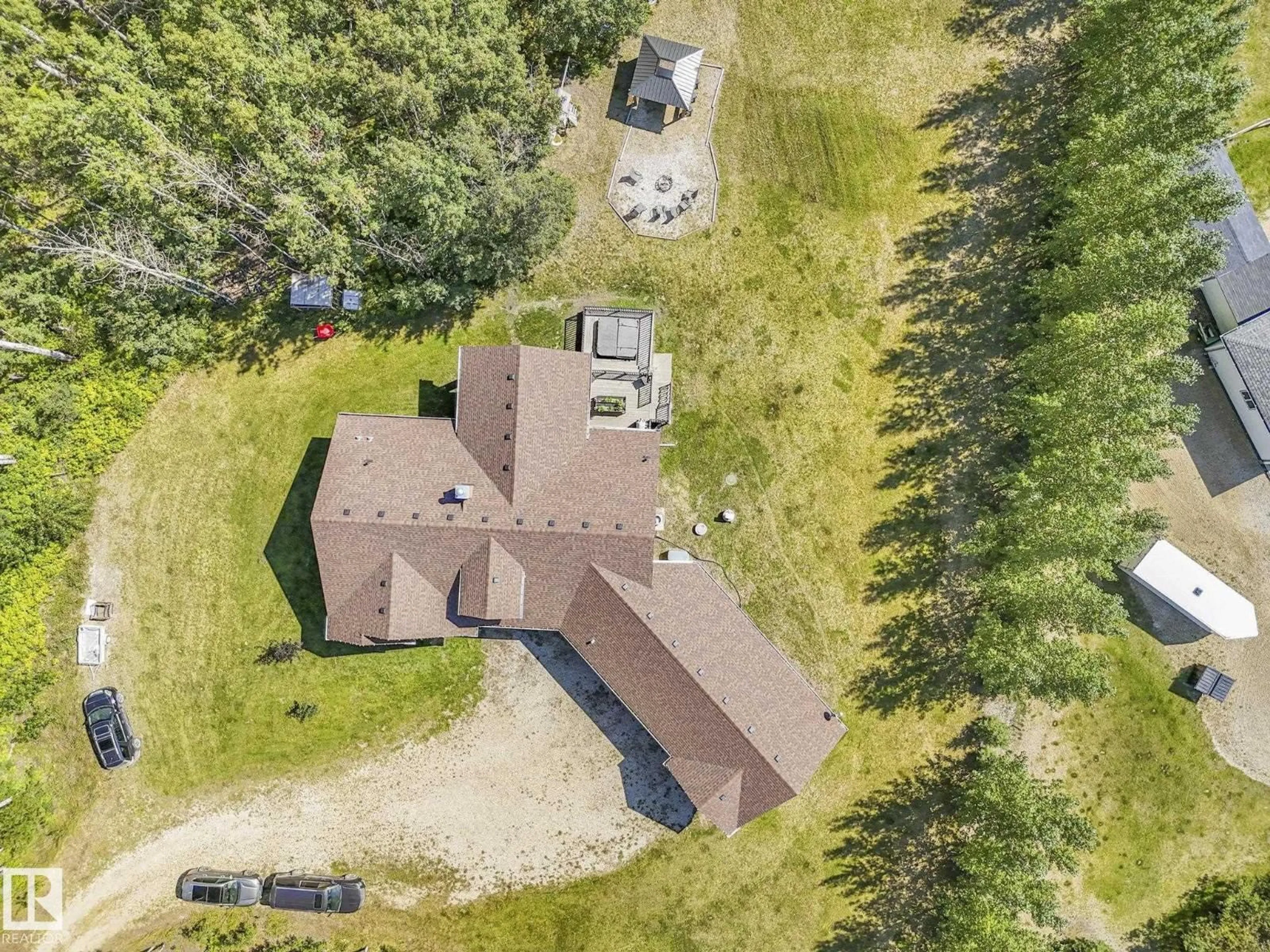 A pic from outside/outdoor area/front of a property/back of a property/a pic from drone, unknown for 31 - 1319 TWP ROAD 510, Rural Parkland County Alberta T7Y2N2