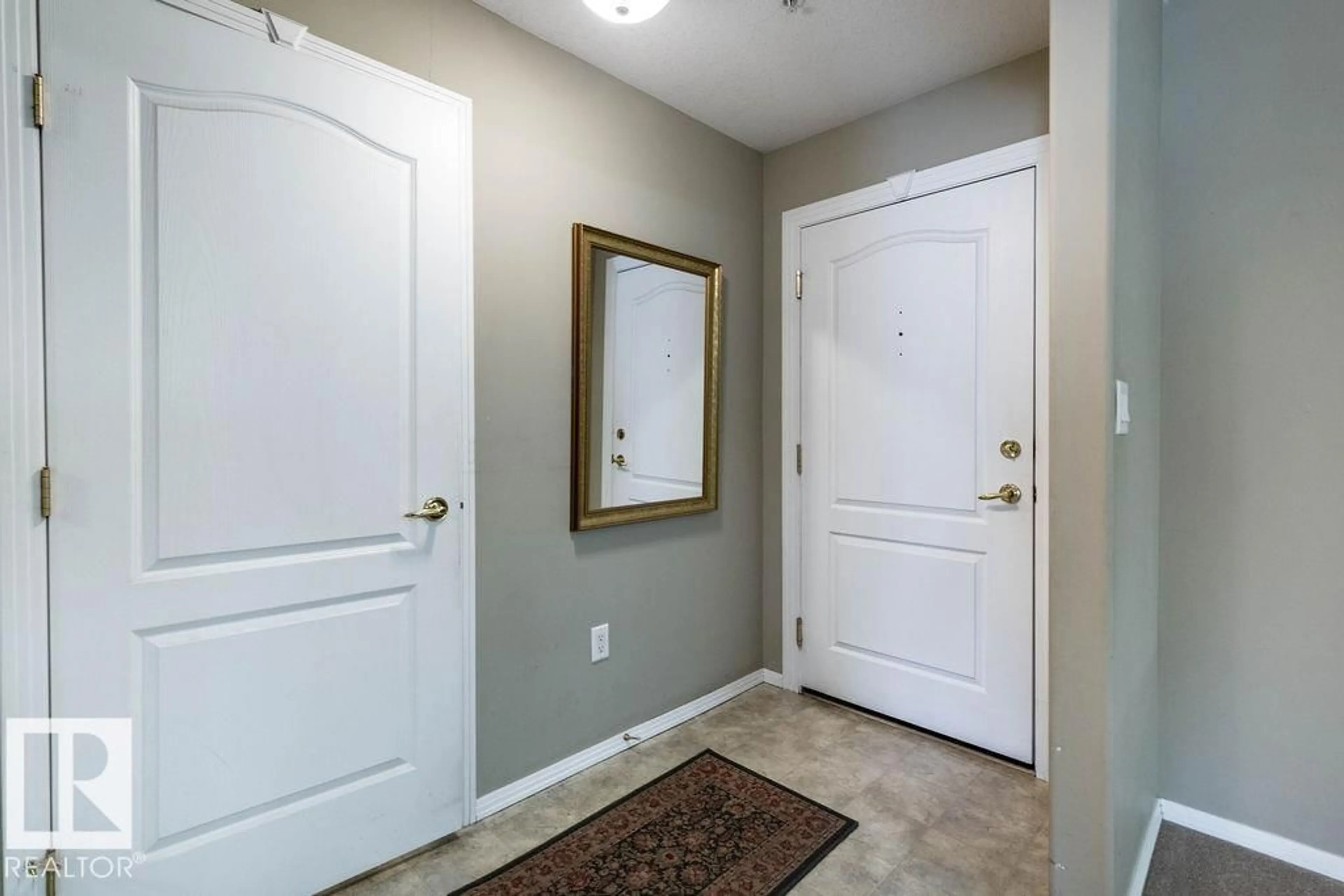 Indoor entryway for 210 - 8942 156 ST, Edmonton Alberta T5R5Z5