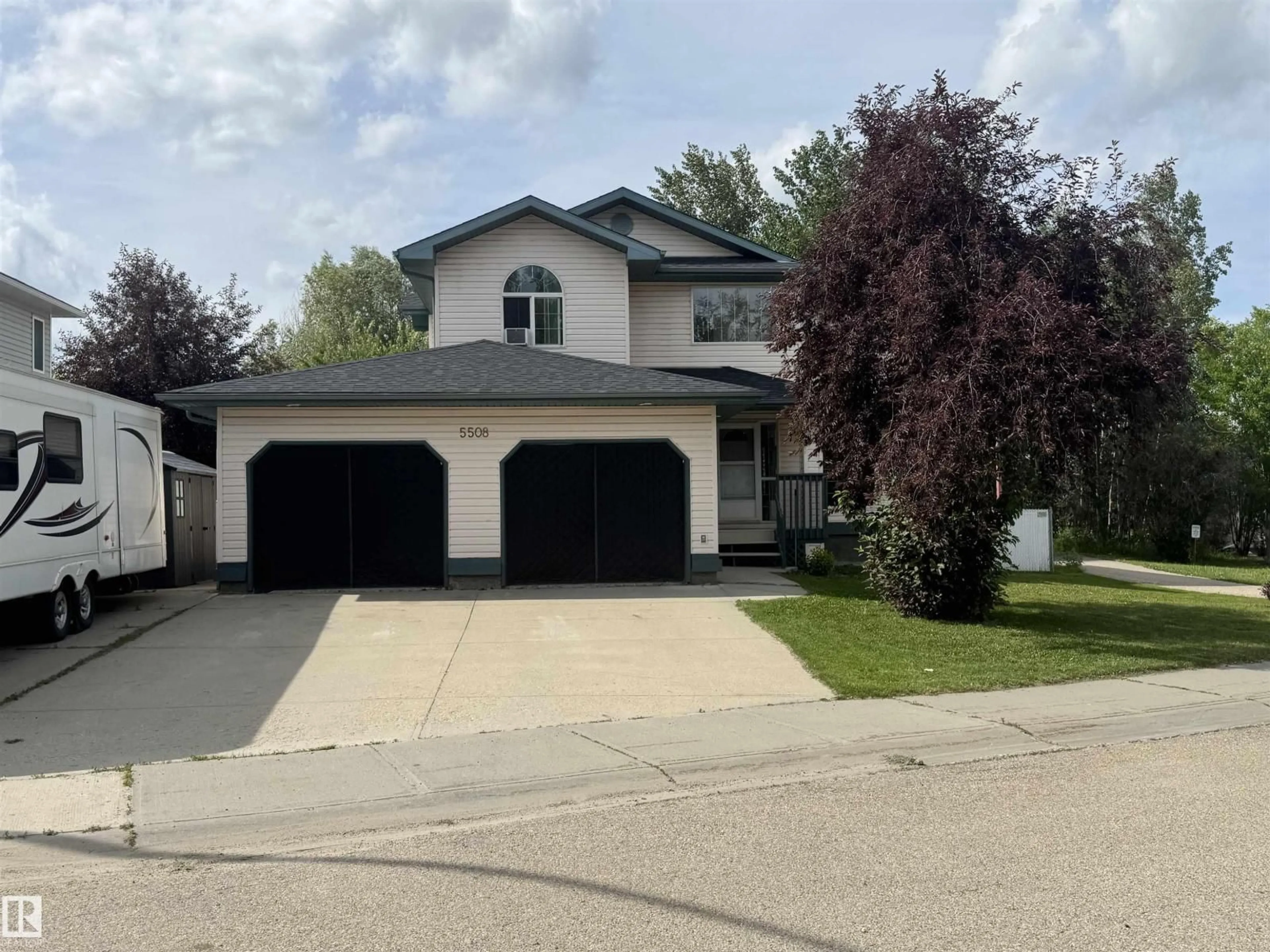 Home with vinyl exterior material, street for 5508 38 ST, Drayton Valley Alberta T7A1L6