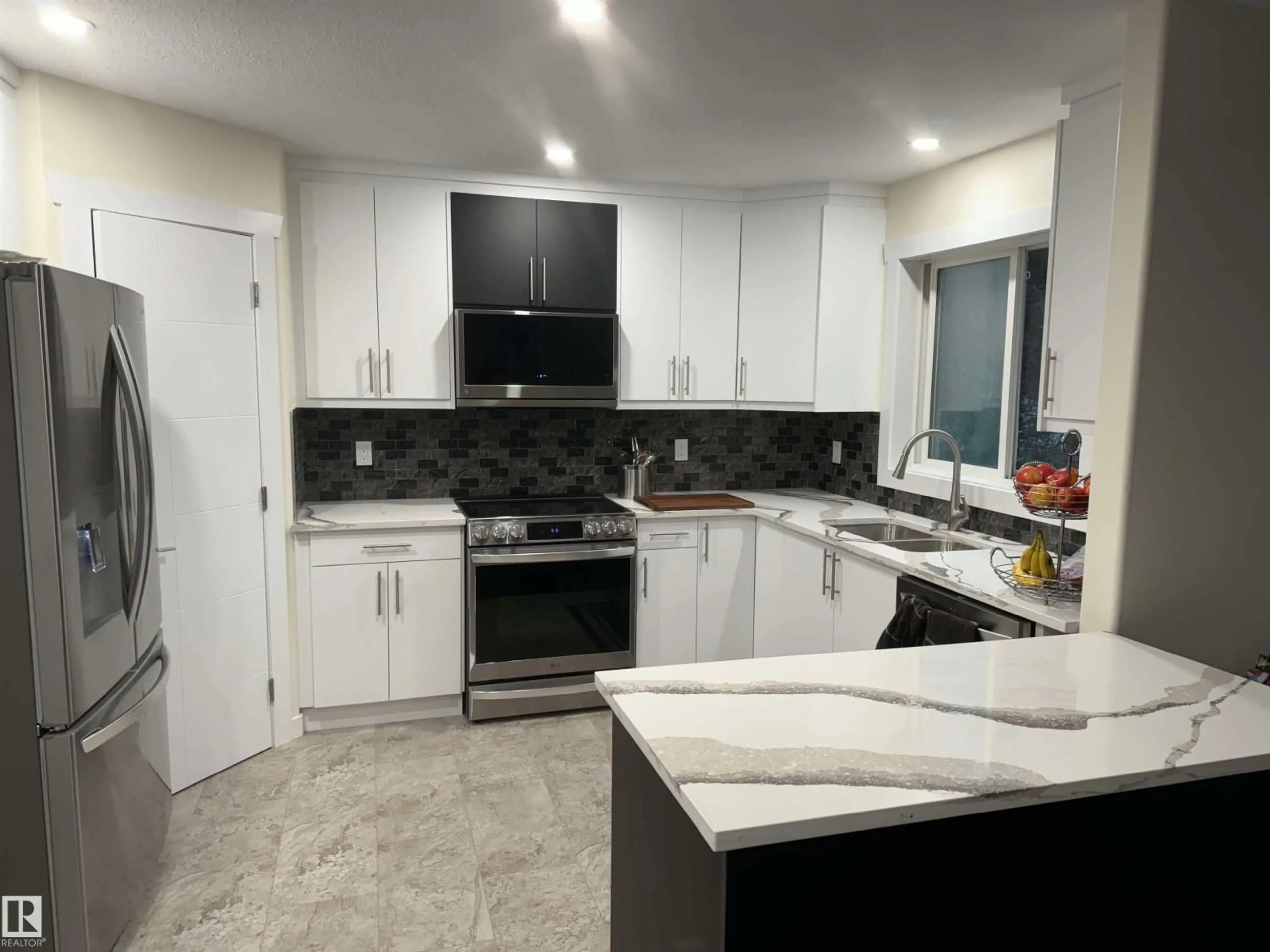 Open concept kitchen, ceramic/tile floor for 5508 38 ST, Drayton Valley Alberta T7A1L6