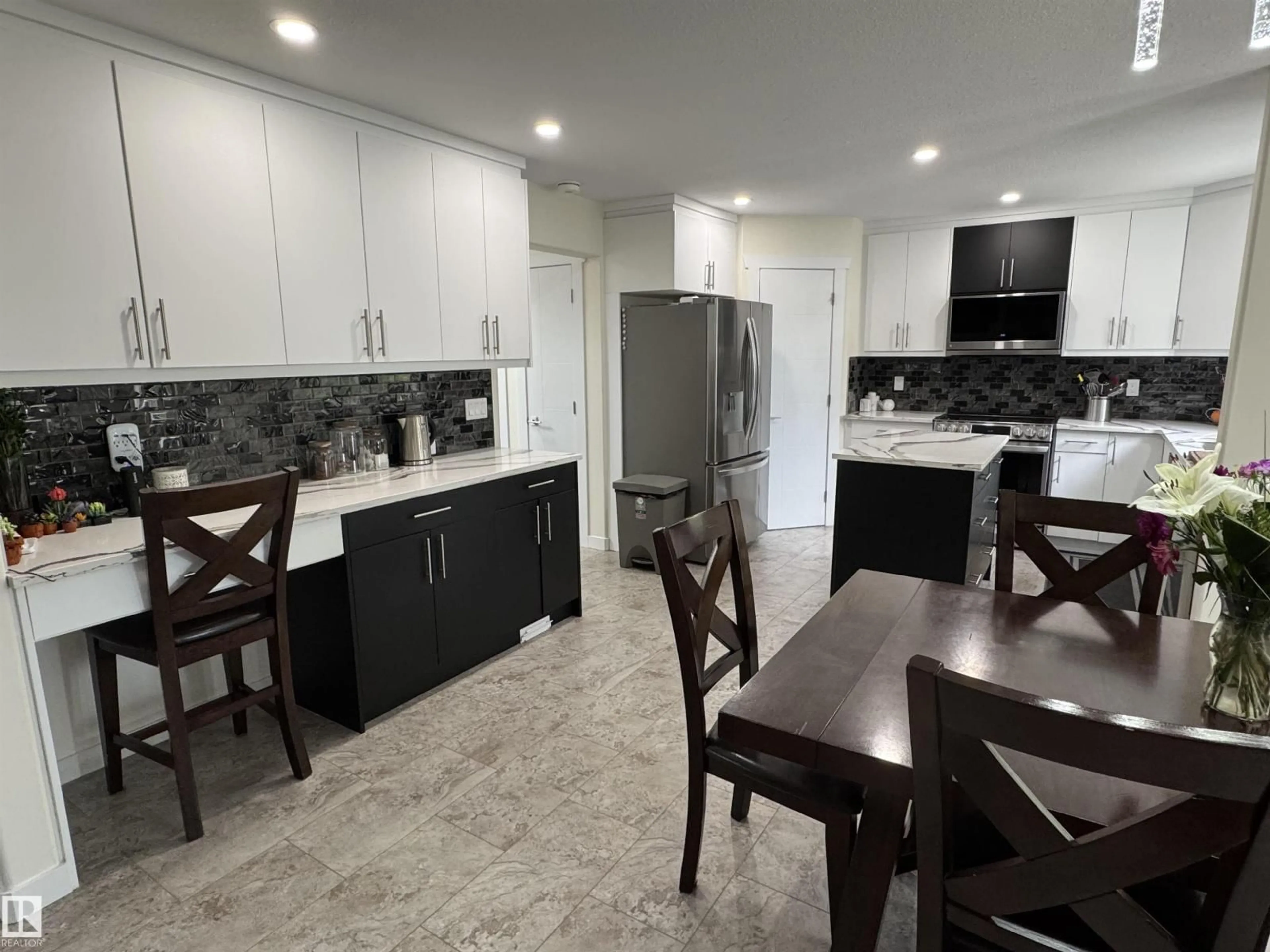 Open concept kitchen, ceramic/tile floor for 5508 38 ST, Drayton Valley Alberta T7A1L6