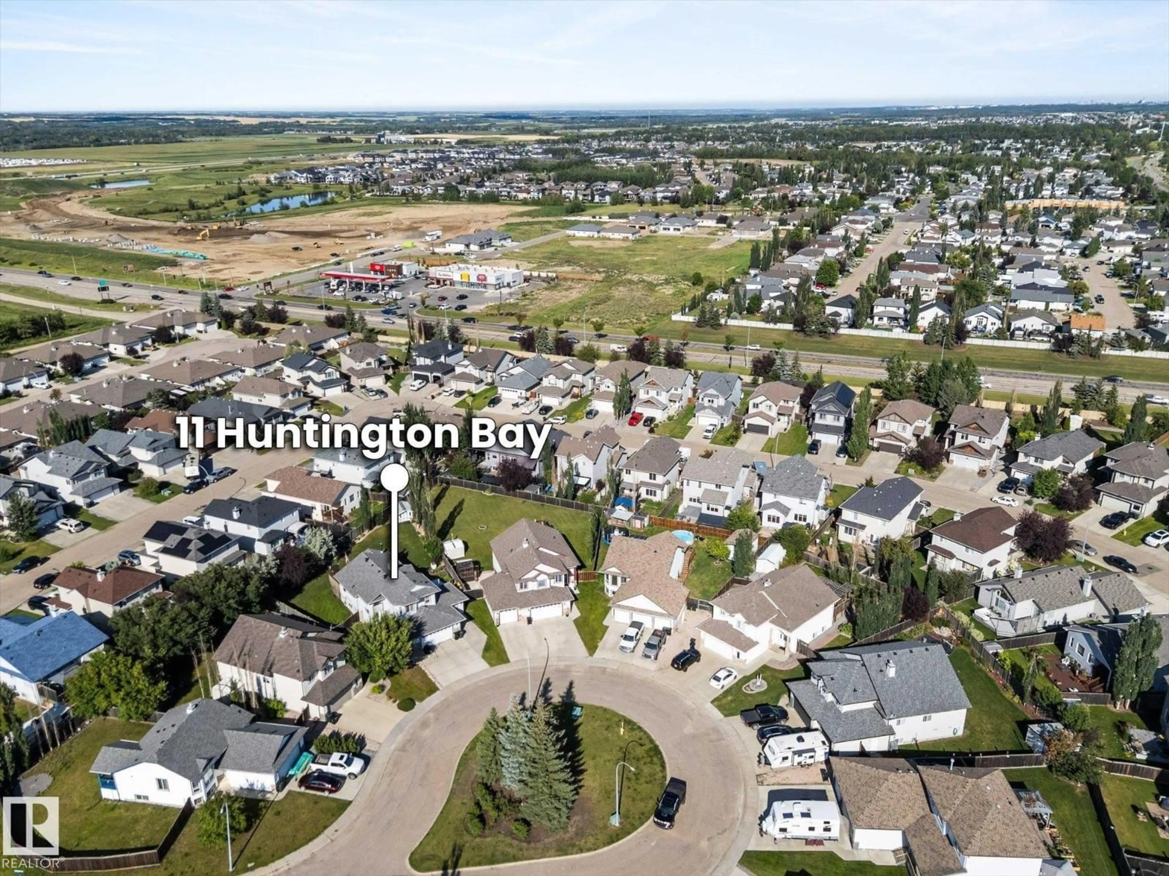 A pic from outside/outdoor area/front of a property/back of a property/a pic from drone, mountain view for 11 HUNTINGTON BA, Spruce Grove Alberta T7X4K7