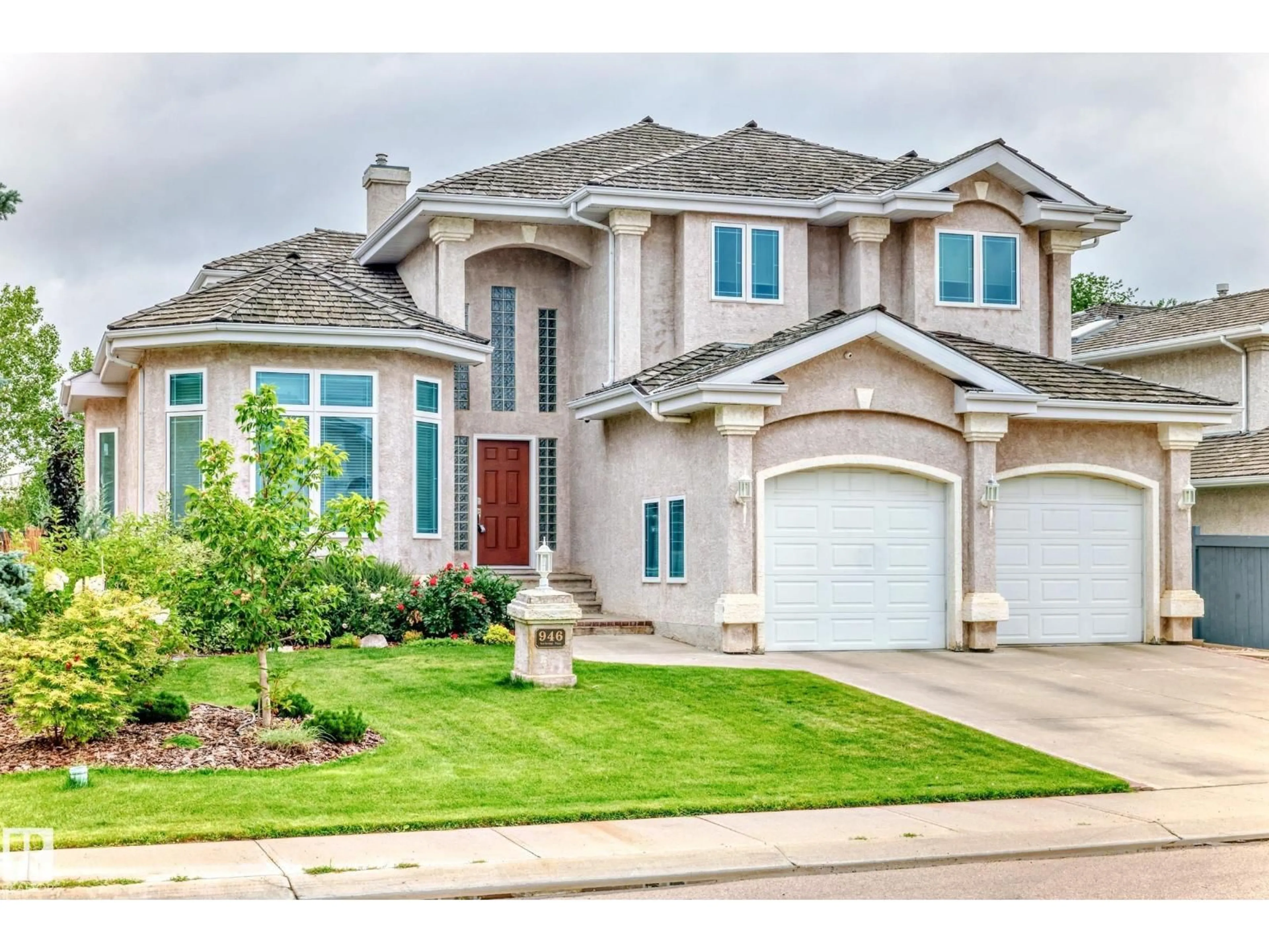 Home with brick exterior material, street for 946 WALLBRIDGE PL, Edmonton Alberta T6M2L7