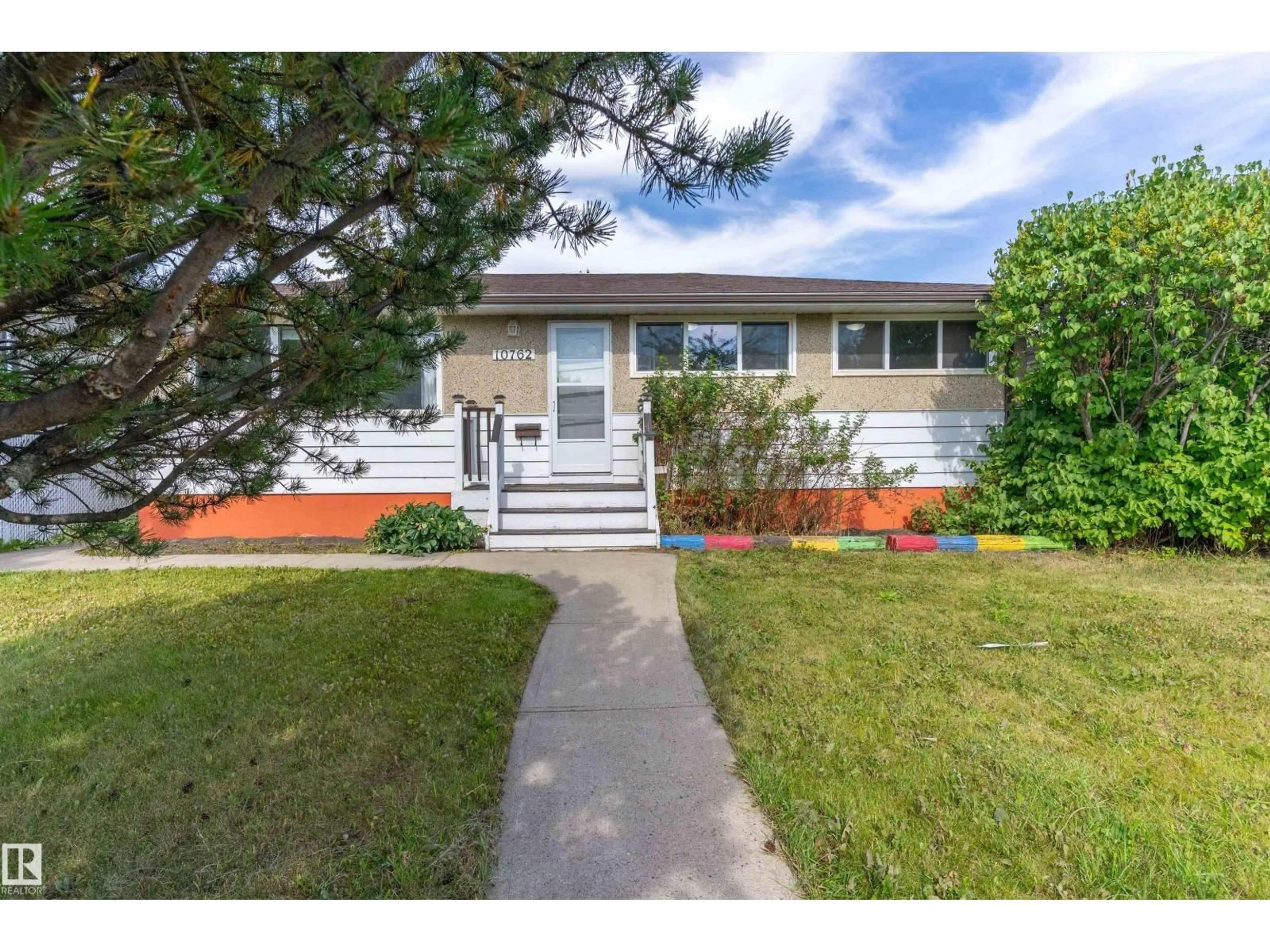 Home with vinyl exterior material, street for NW - 10762 164 ST, Edmonton Alberta T5P3R9