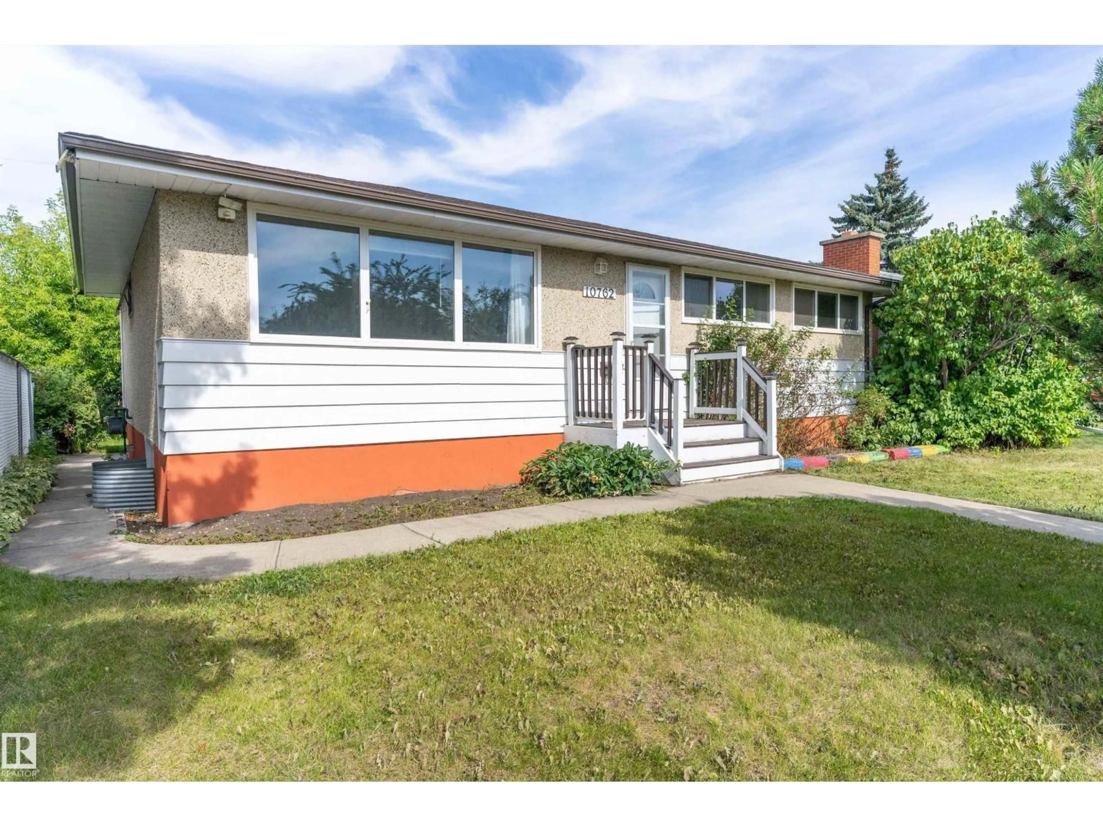 Home with vinyl exterior material, street for NW - 10762 164 ST, Edmonton Alberta T5P3R9