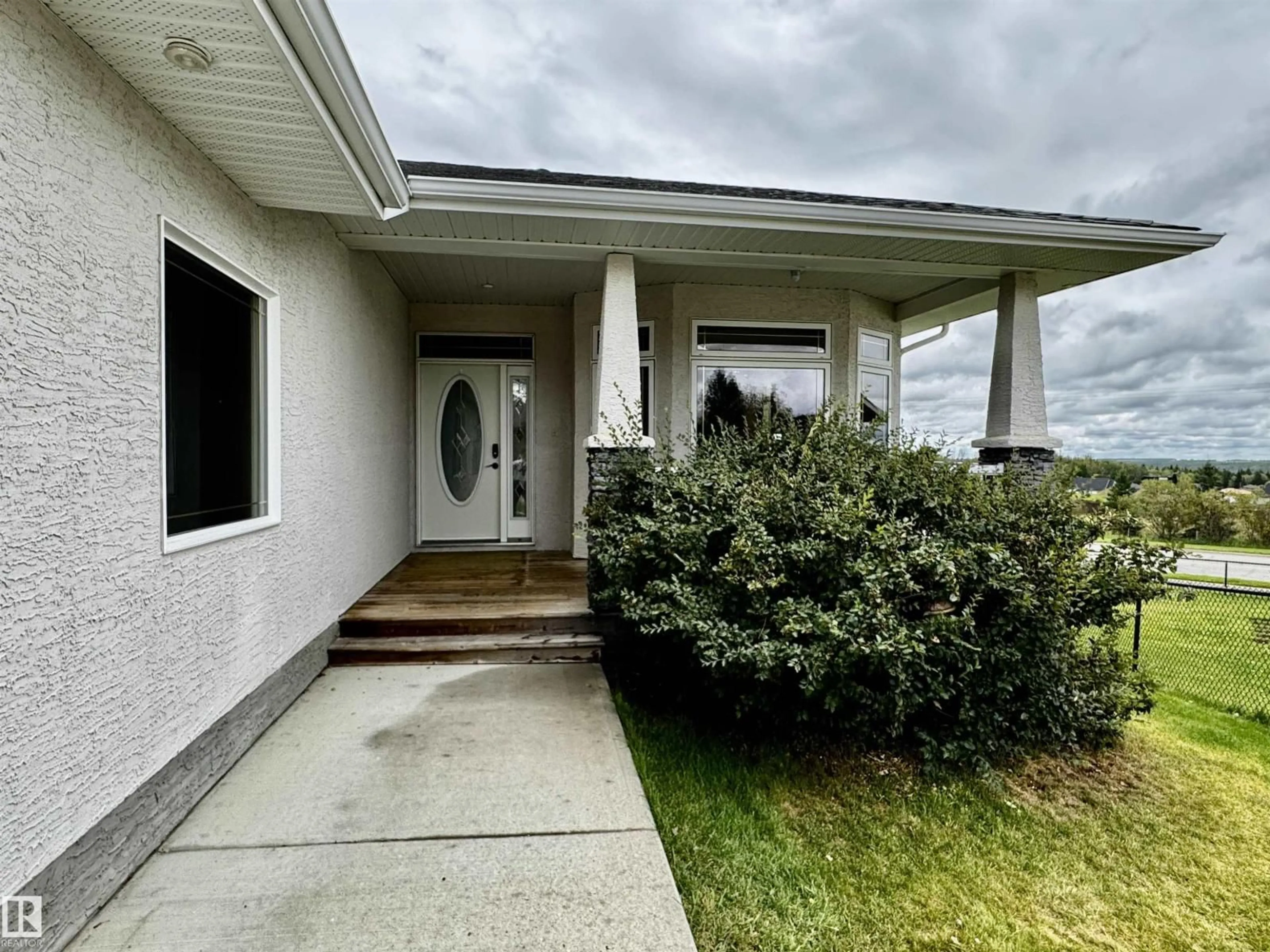 Home with vinyl exterior material, street for 3806 44A AV, Drayton Valley Alberta T7A1V9