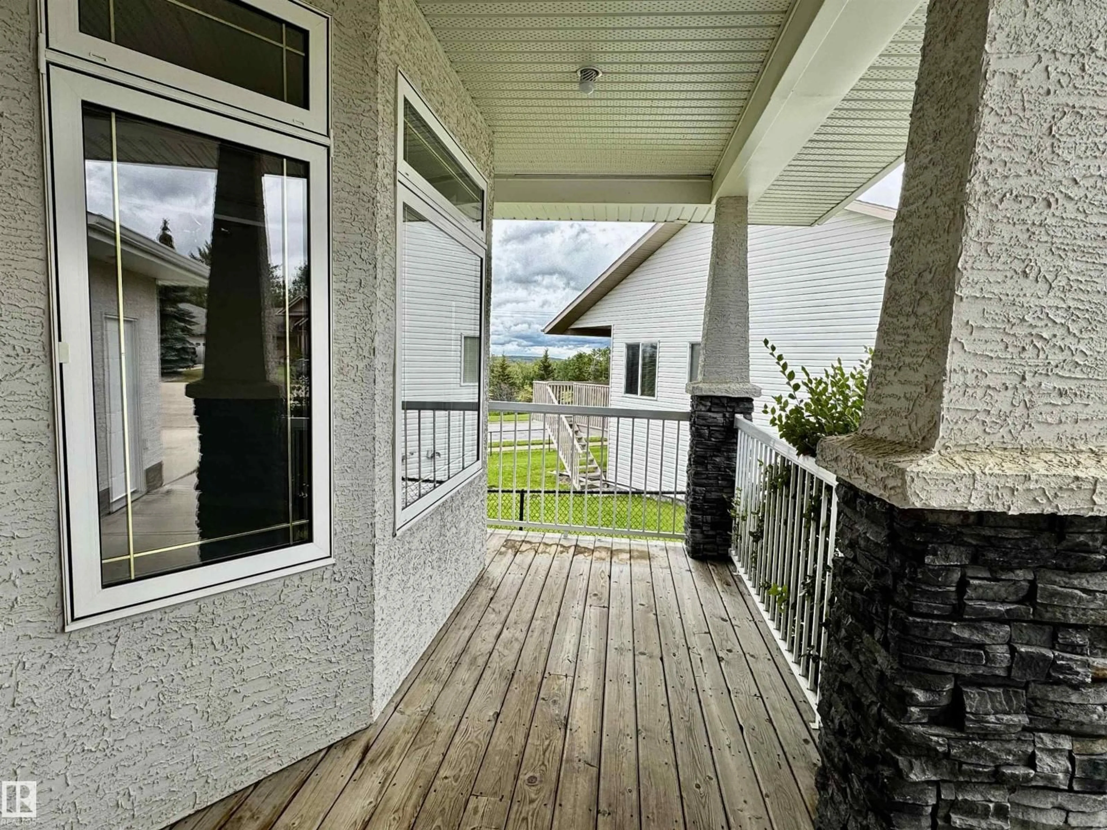 Home with vinyl exterior material, street for 3806 44A AV, Drayton Valley Alberta T7A1V9