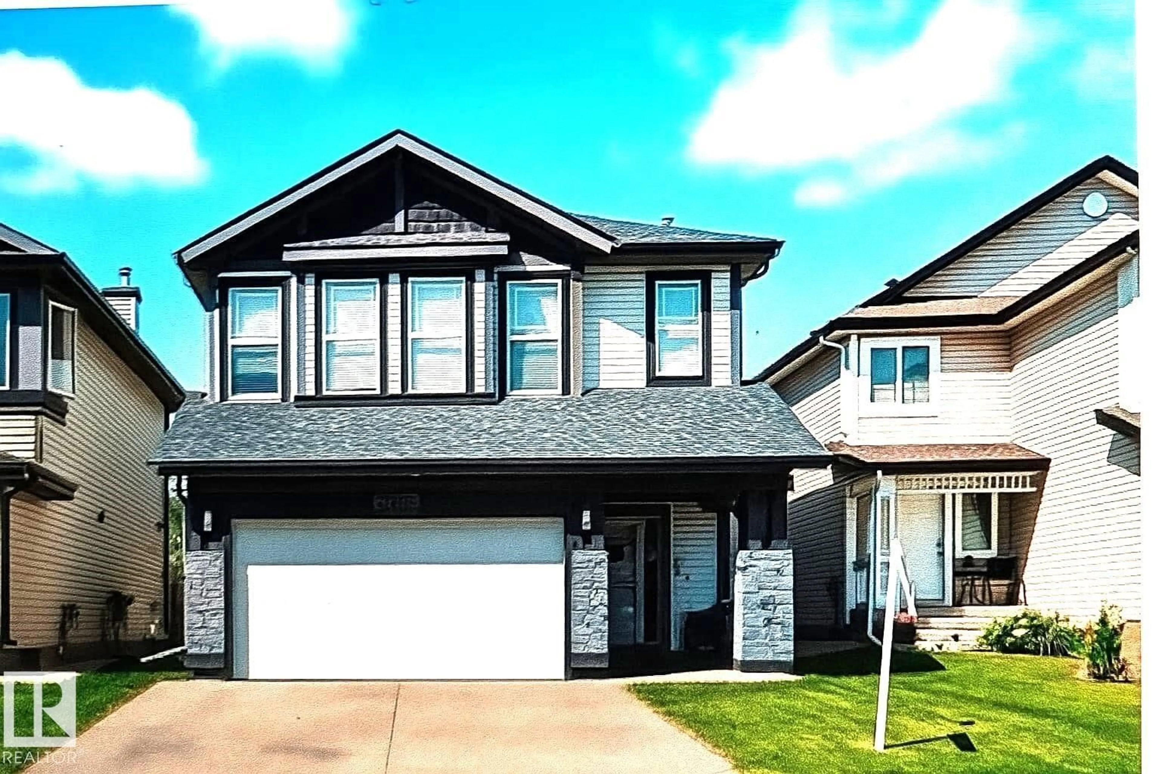 Home with vinyl exterior material, street for NW - 14980 138 ST, Edmonton Alberta T6V1N9
