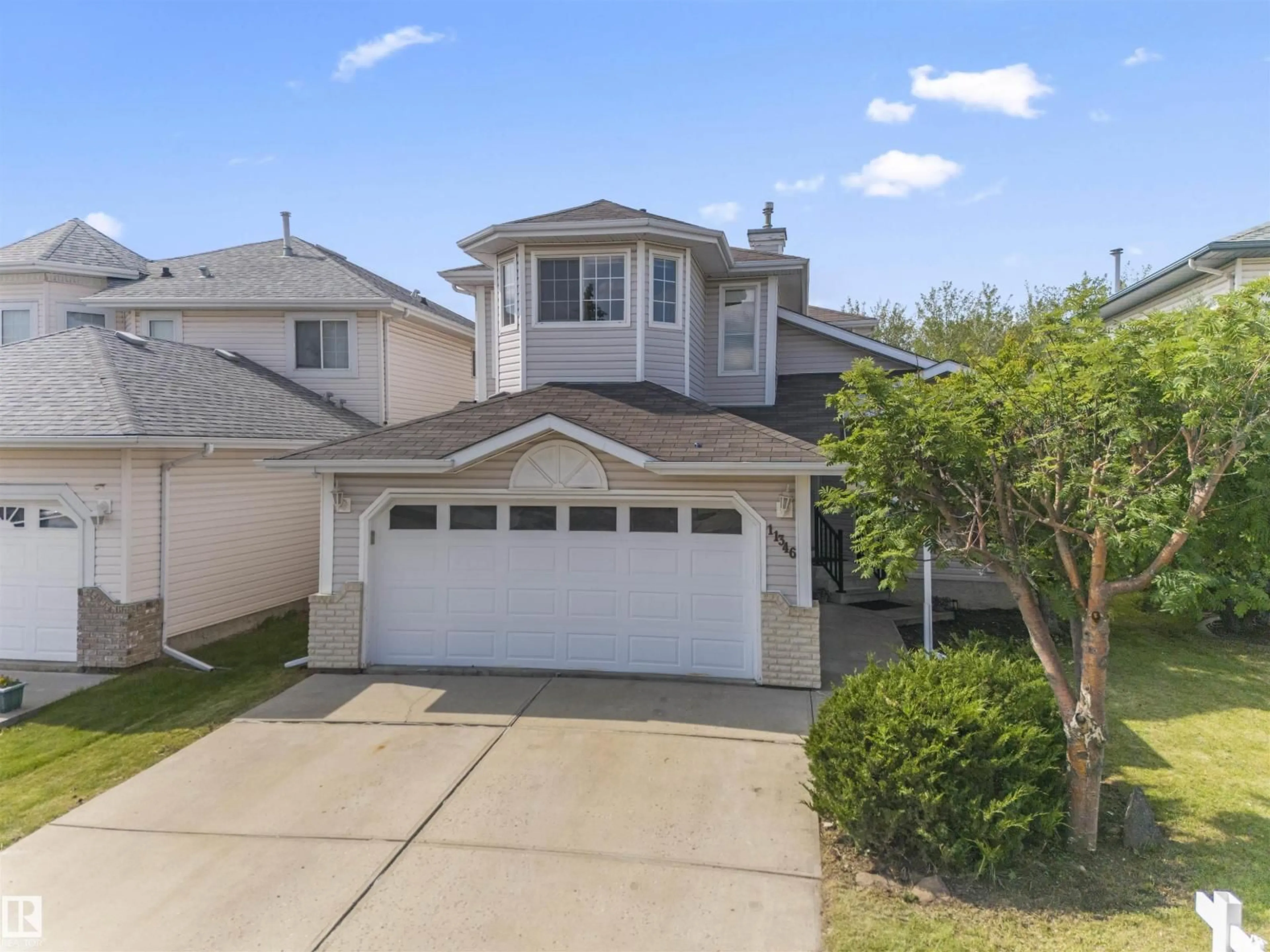 A pic from outside/outdoor area/front of a property/back of a property/a pic from drone, street for 11346 173 AV, Edmonton Alberta T5X5Y7