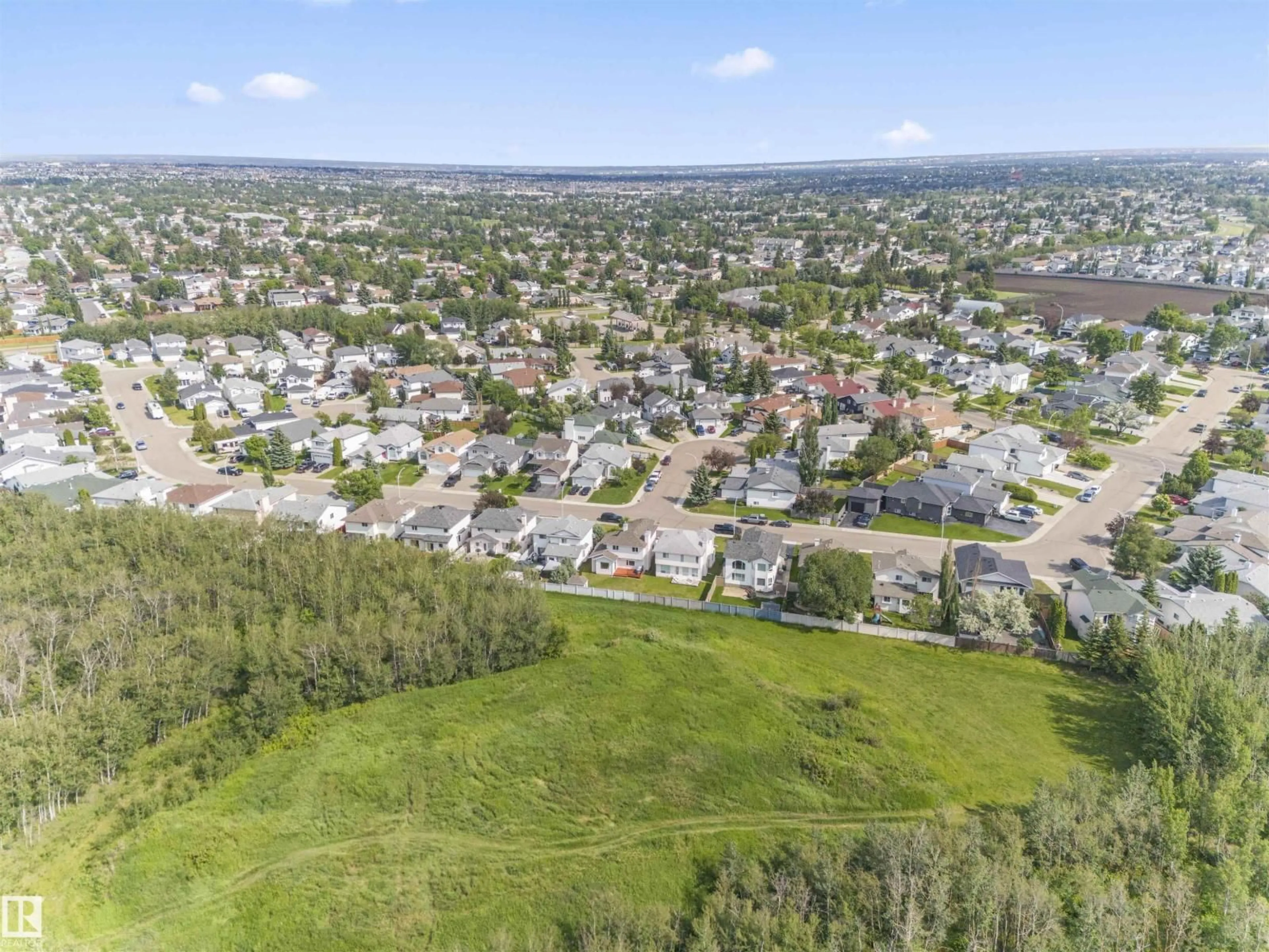 A pic from outside/outdoor area/front of a property/back of a property/a pic from drone, mountain view for 11346 173 AV, Edmonton Alberta T5X5Y7
