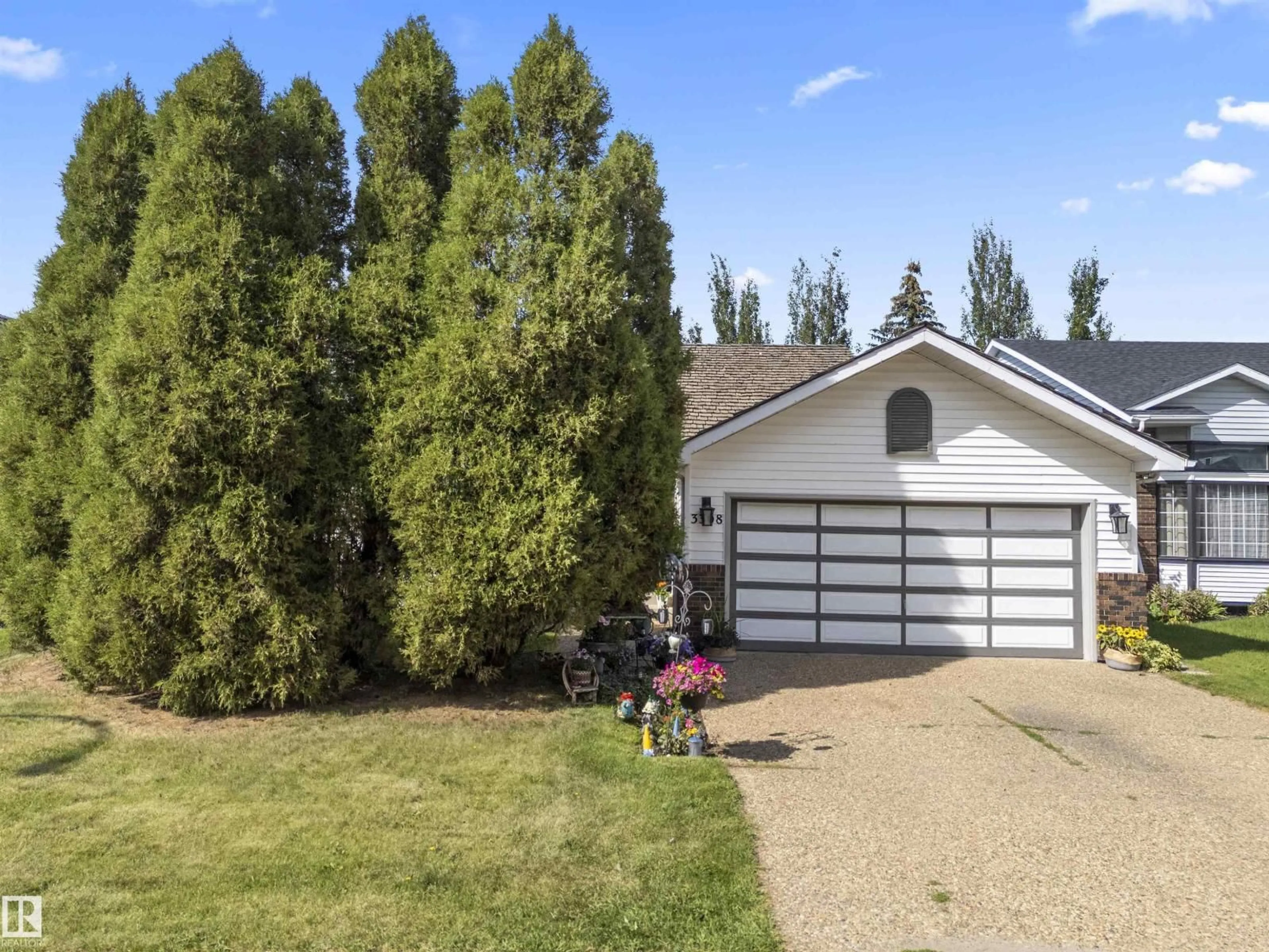 Home with vinyl exterior material, street for 3308 42A AV, Edmonton Alberta T6T1E5
