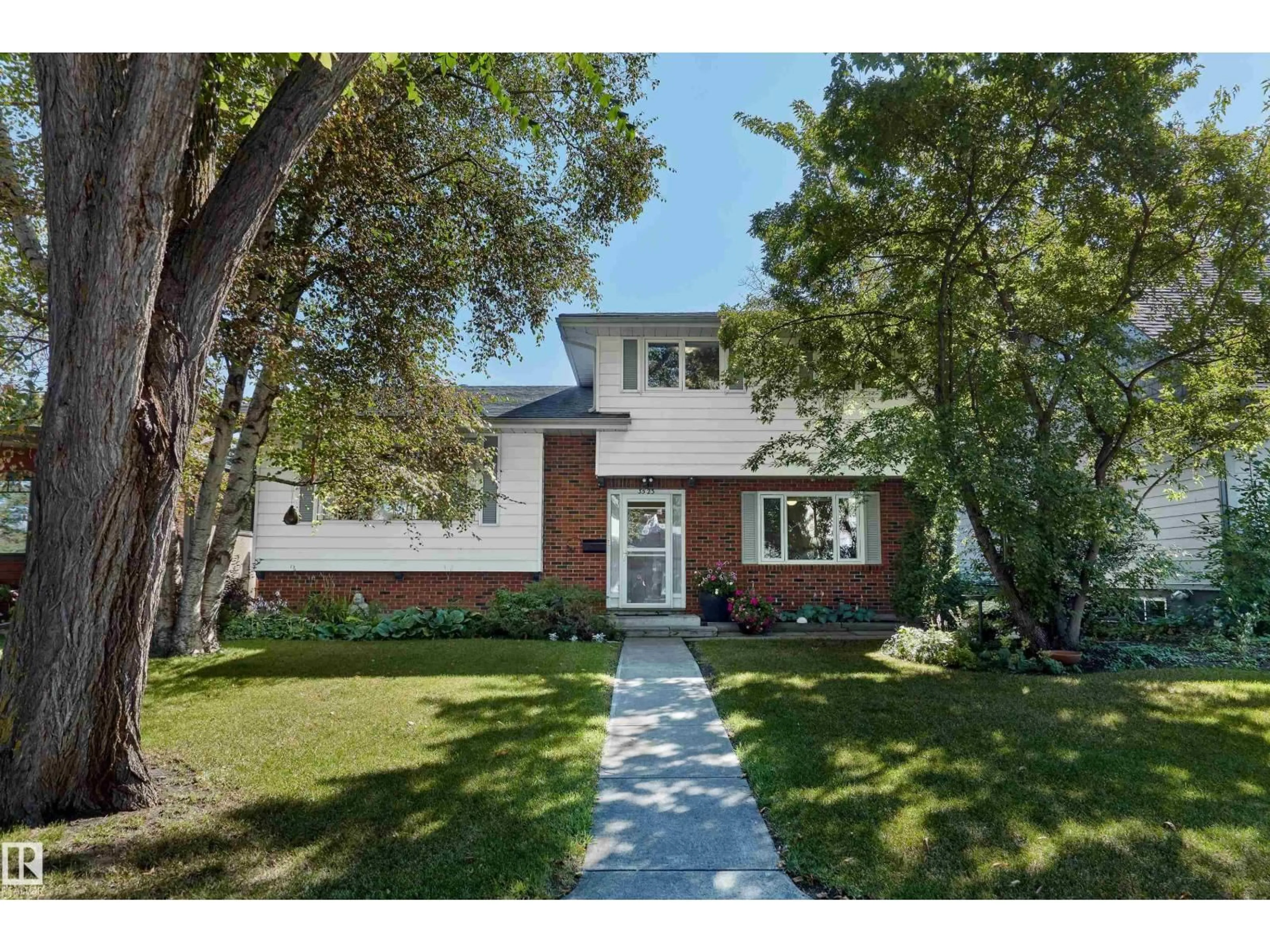 Home with brick exterior material, street for NW - 3523 113B ST, Edmonton Alberta T6J1L6
