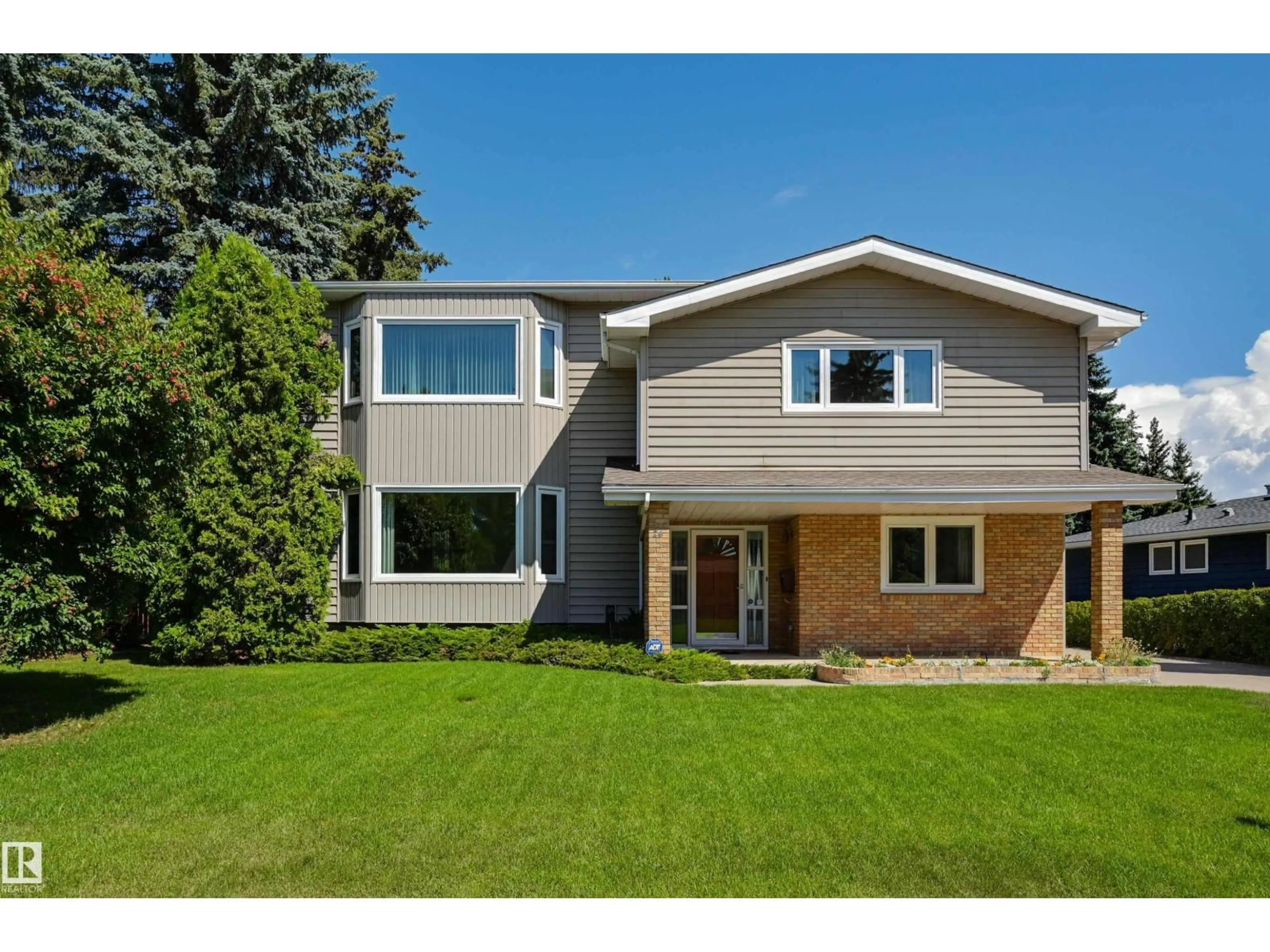 Home with brick exterior material, street for 24 QUESNELL RD, Edmonton Alberta T5R5N2
