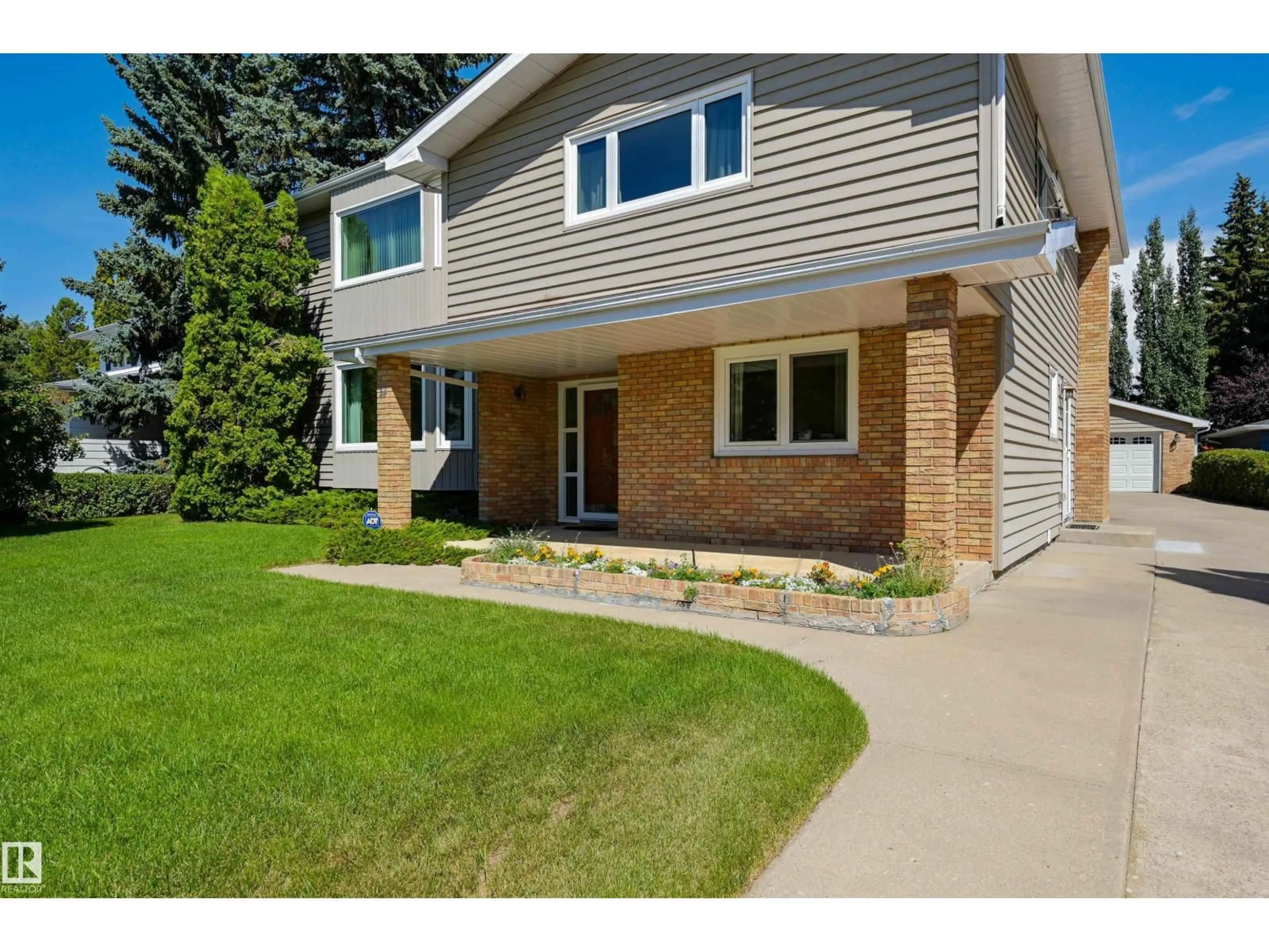Home with brick exterior material, street for 24 QUESNELL RD, Edmonton Alberta T5R5N2