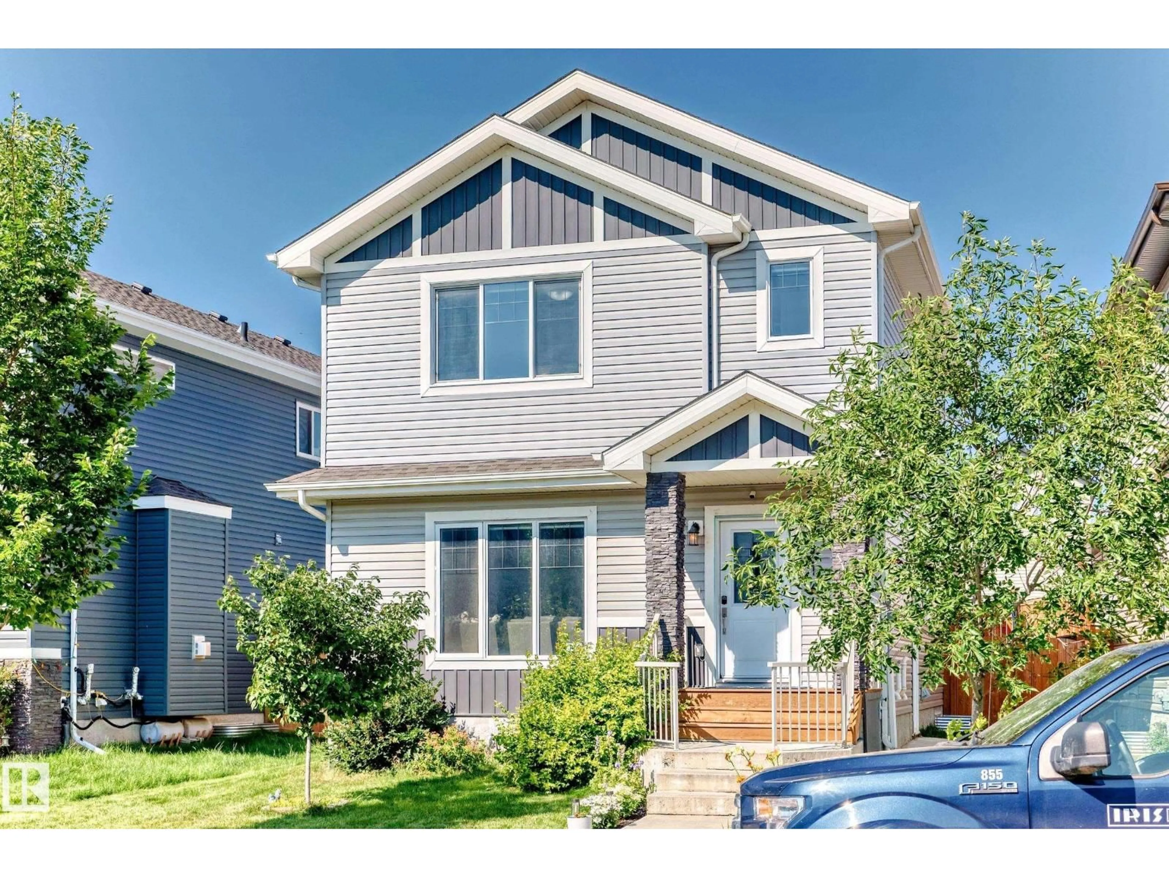 Home with vinyl exterior material, street for 2716 11 ST, Edmonton Alberta T6T0X9