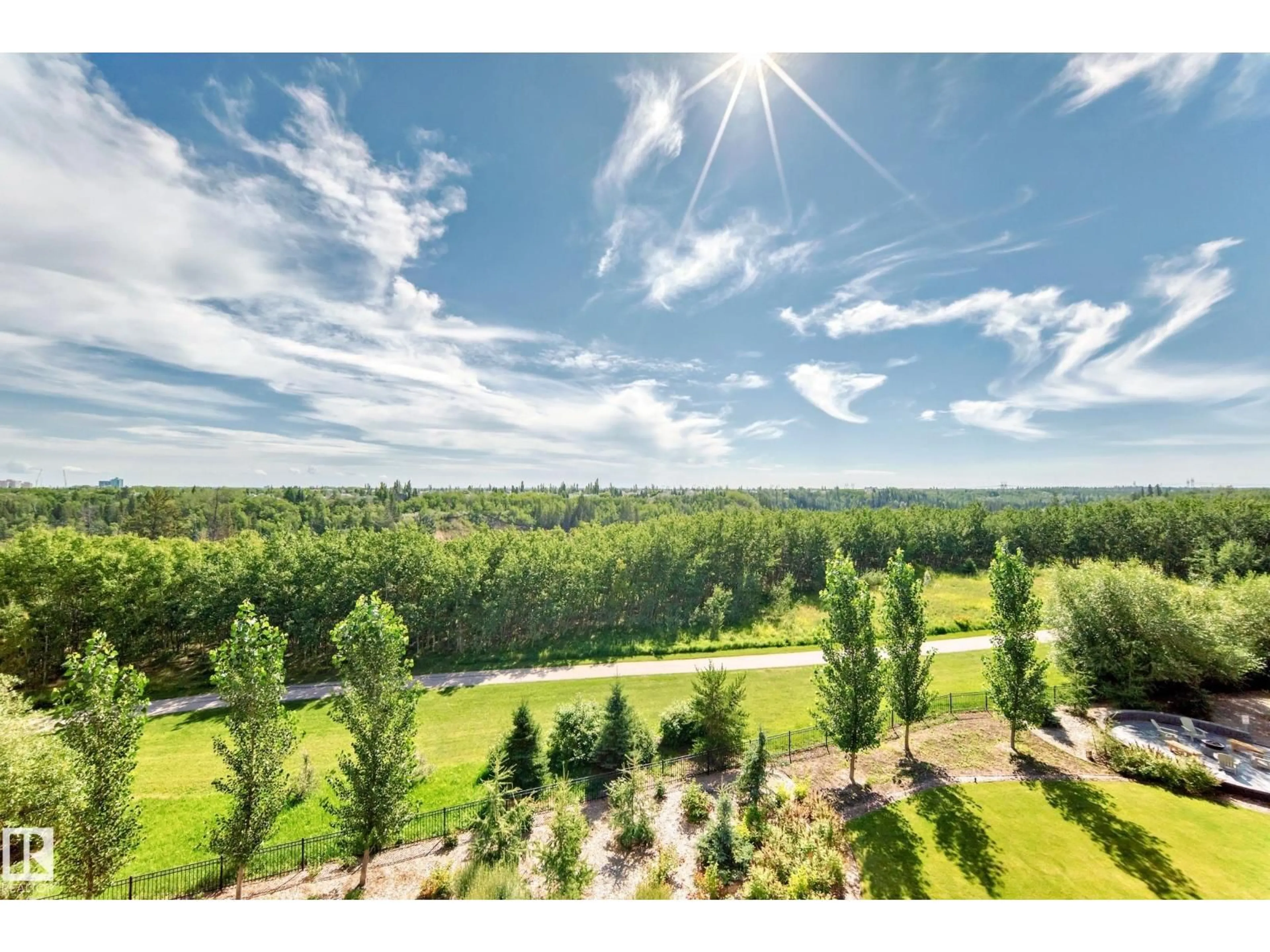 A pic from outside/outdoor area/front of a property/back of a property/a pic from drone, forest/trees view for 408 - 7463 MAY CM, Edmonton Alberta T6R0X1