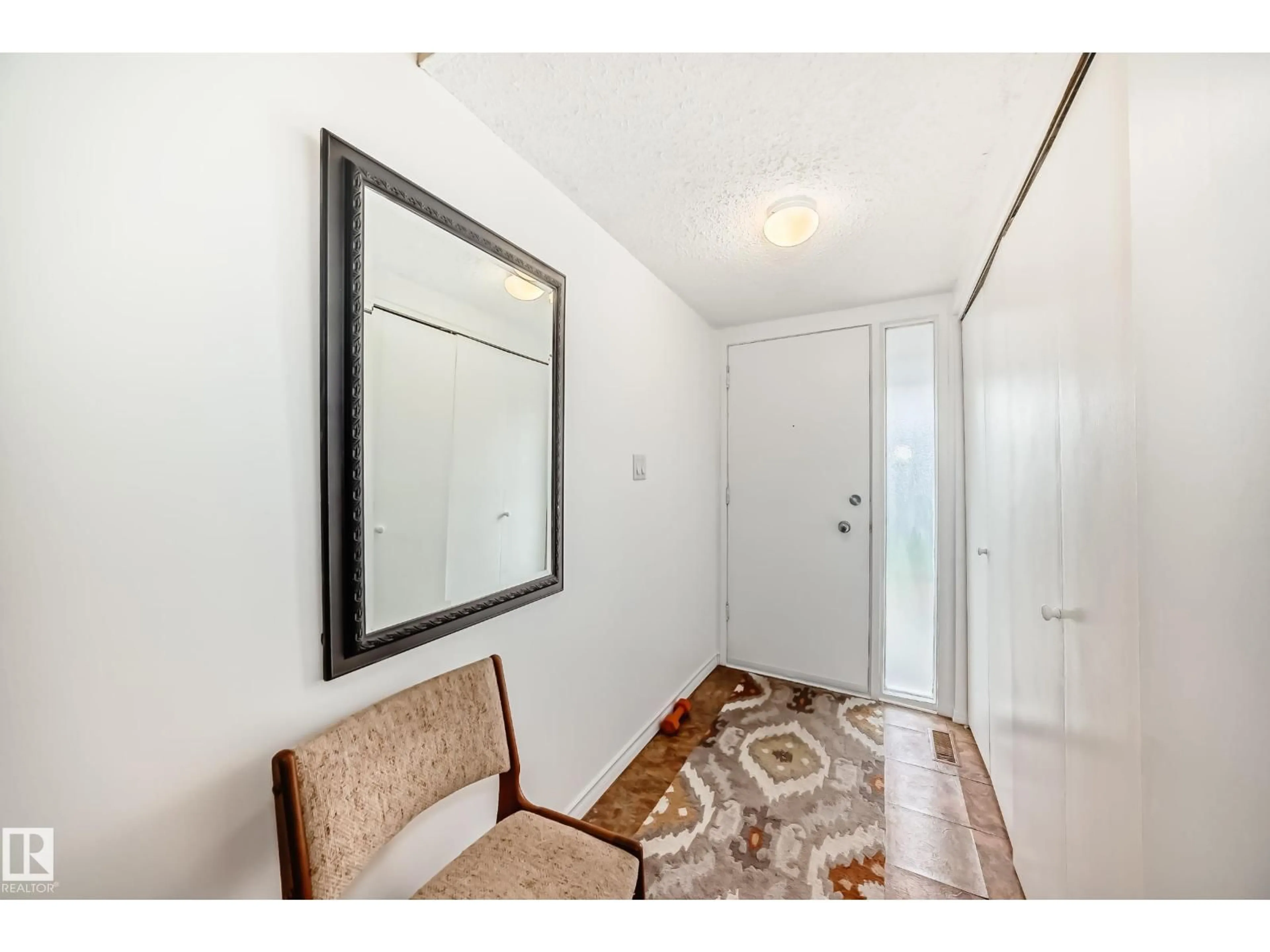 Indoor entryway for 1049 MILLBOURNE E NW, Edmonton Alberta T6K2K2