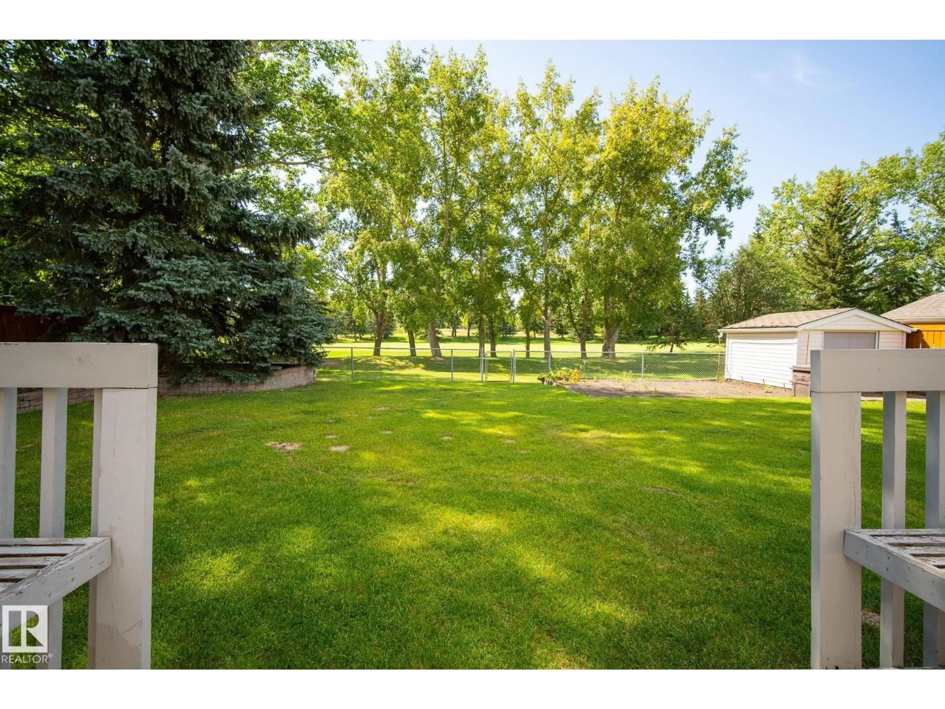 A pic from outside/outdoor area/front of a property/back of a property/a pic from drone, forest/trees view for 20 MARDALE CR, Sherwood Park Alberta T8A3N5