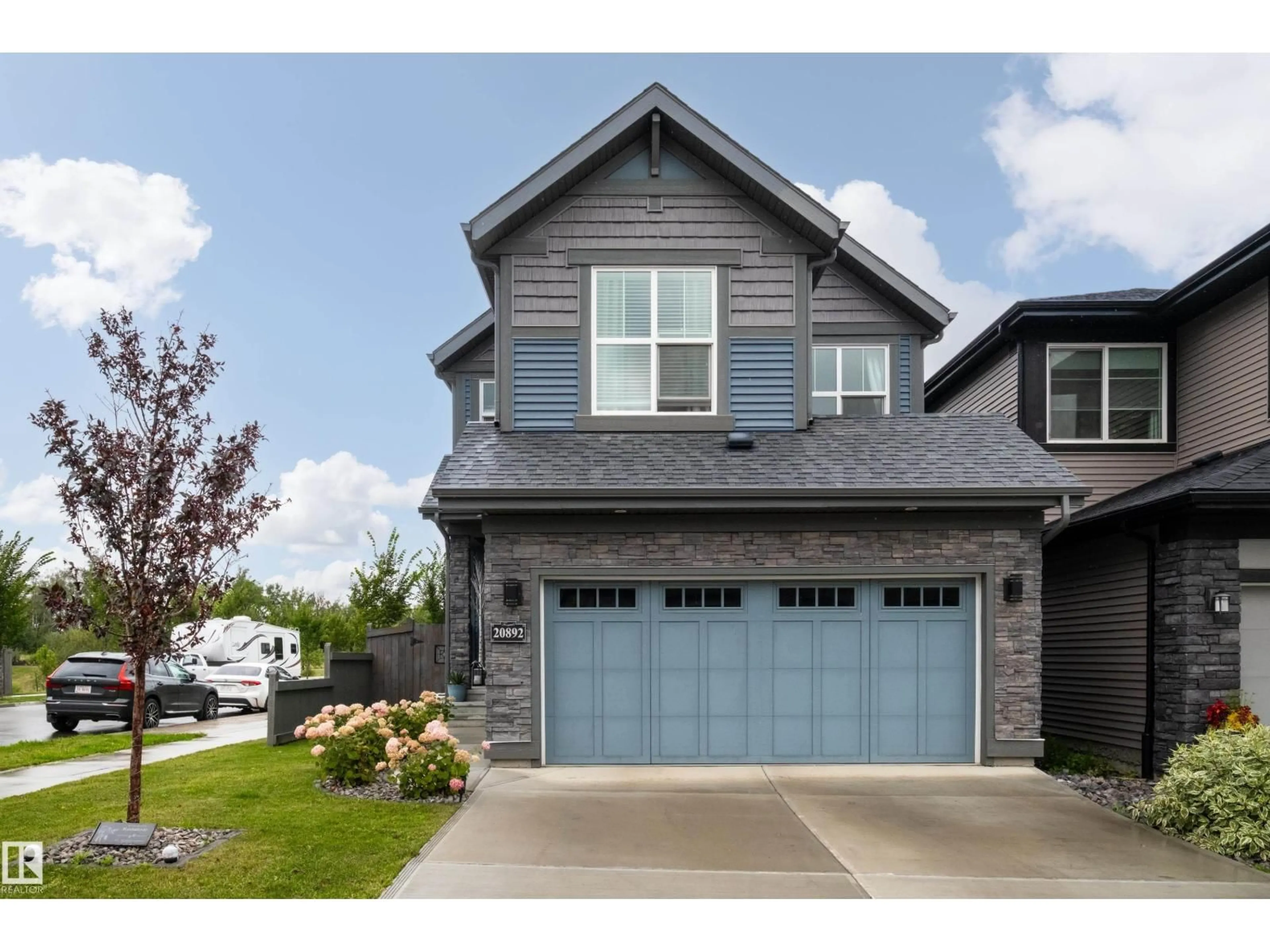 Home with vinyl exterior material, street for NW - 20892 131 AV, Edmonton Alberta T5S0P1