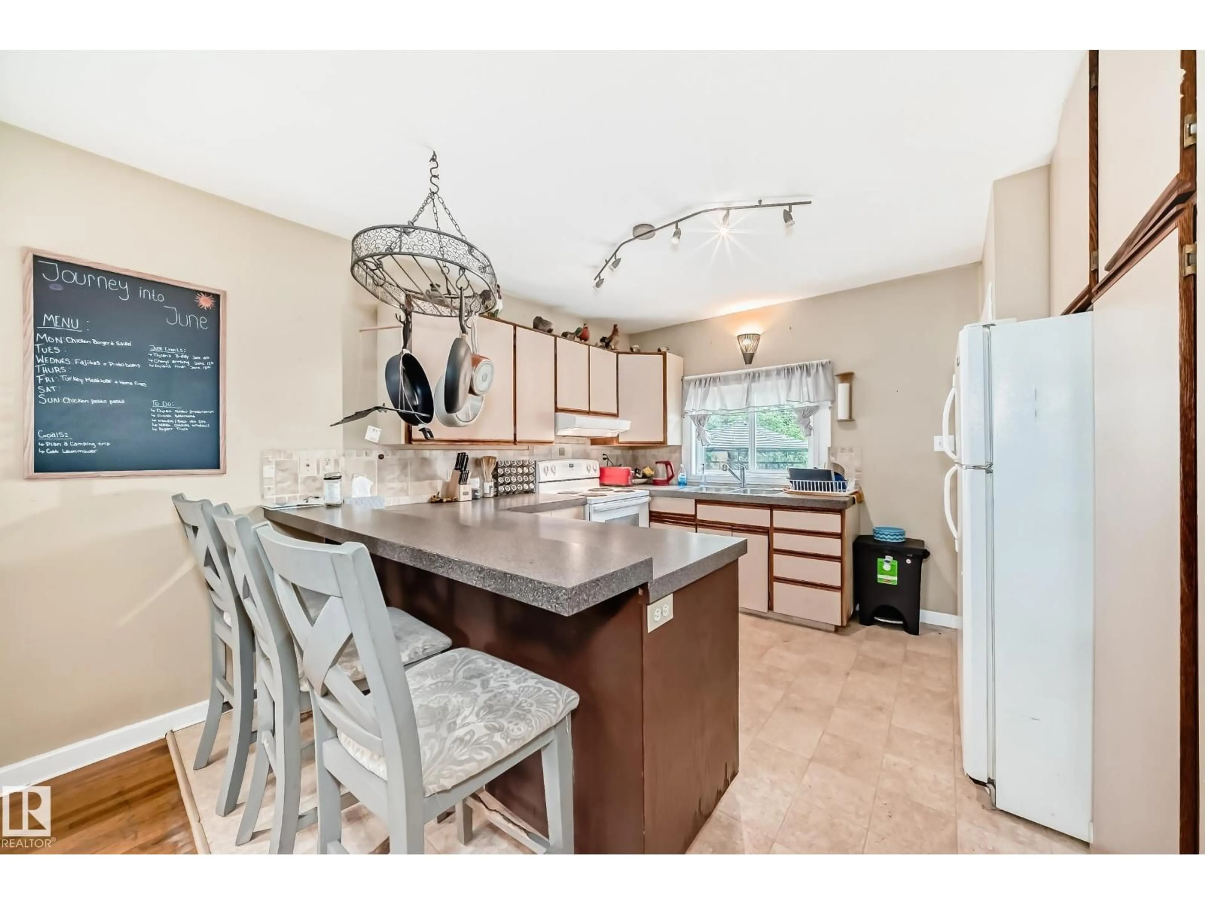 Open concept kitchen, ceramic/tile floor for 8950 80 AV, Edmonton Alberta T6C0Y7