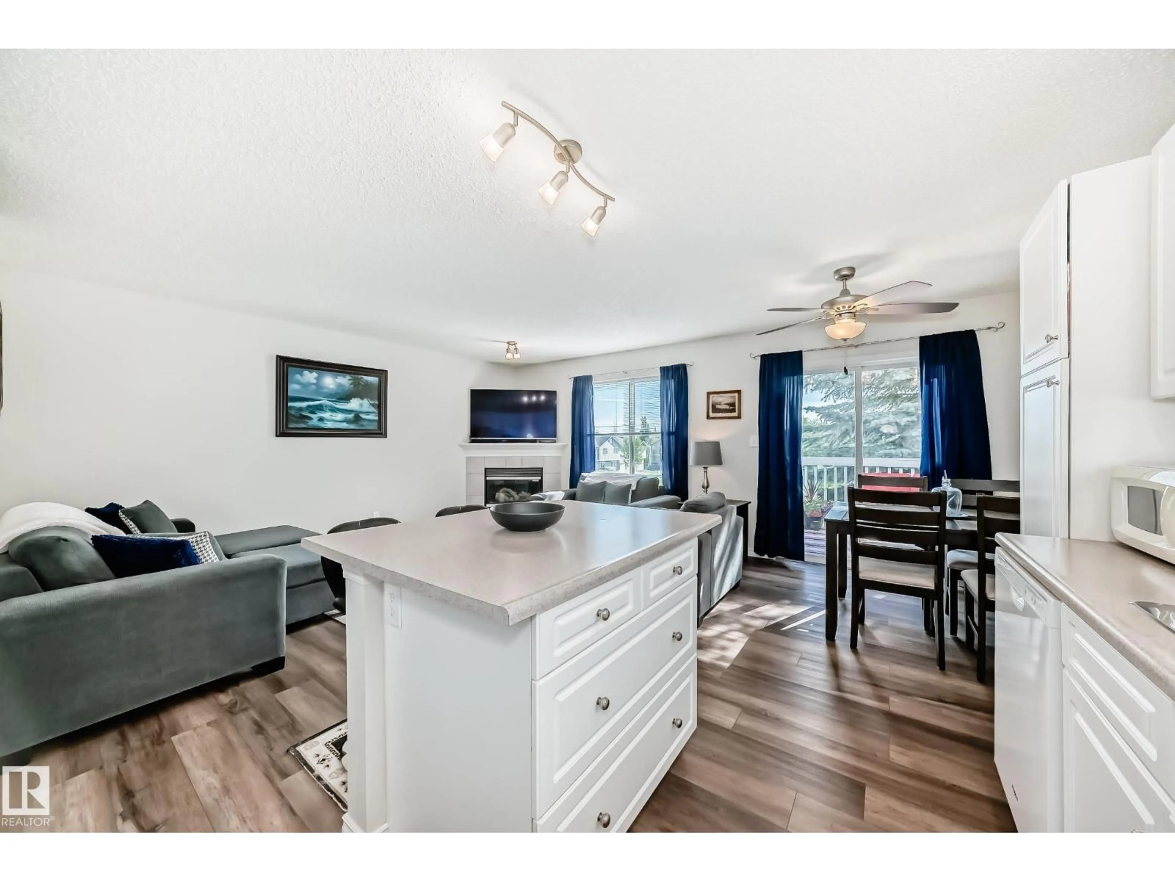 Open concept kitchen, wood/laminate floor for 7 - 115 CHESTERMERE DR, Sherwood Park Alberta T8H2W4