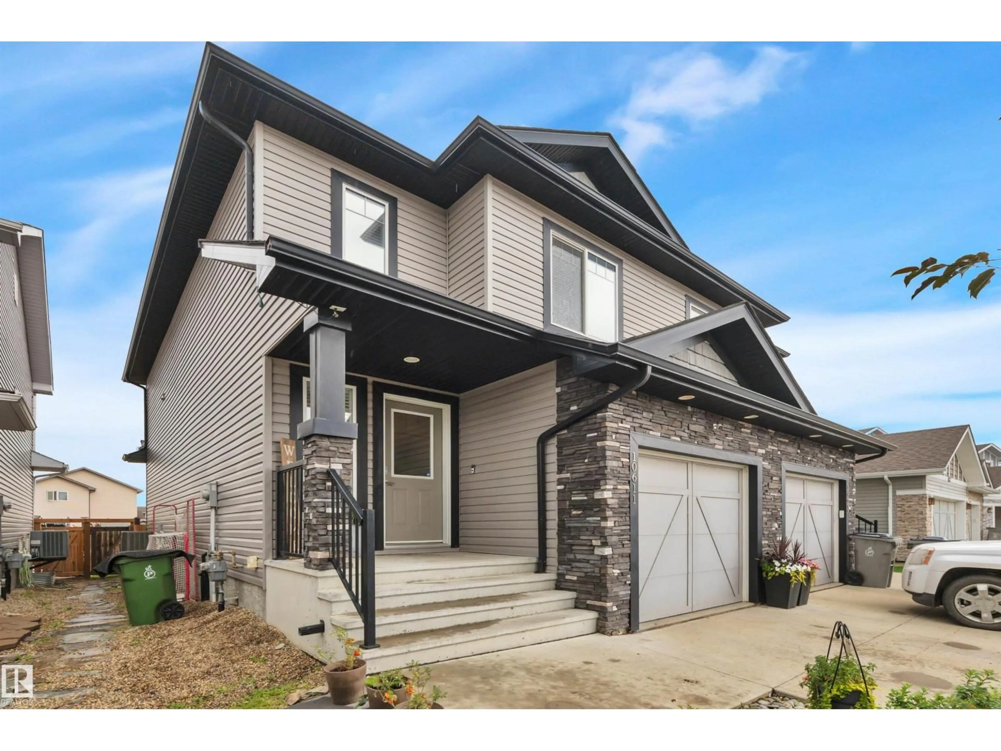Home with vinyl exterior material, street for 10611 98 ST, Morinville Alberta T8R2P2