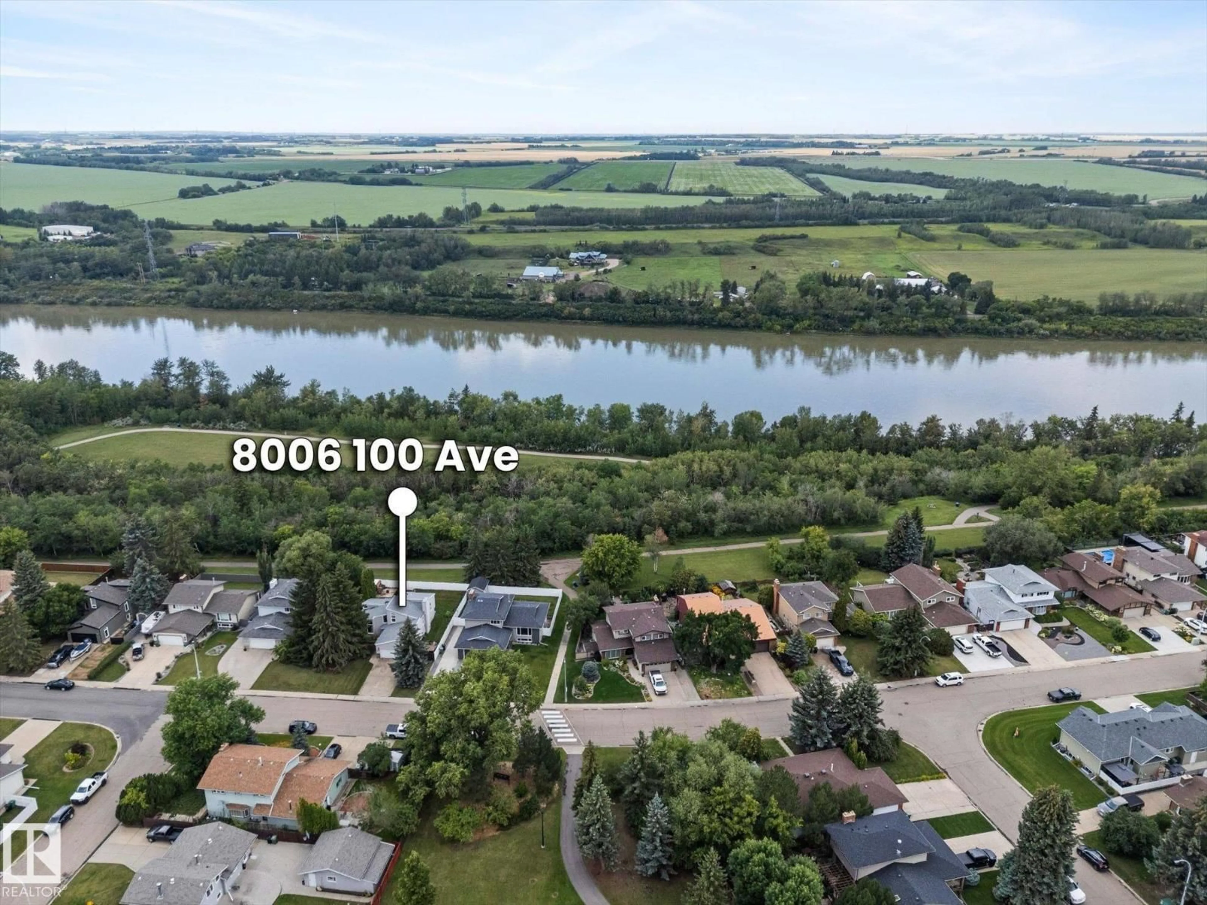 A pic from outside/outdoor area/front of a property/back of a property/a pic from drone, water/lake/river/ocean view for 8006 100 AV, Fort Saskatchewan Alberta T8L3K3