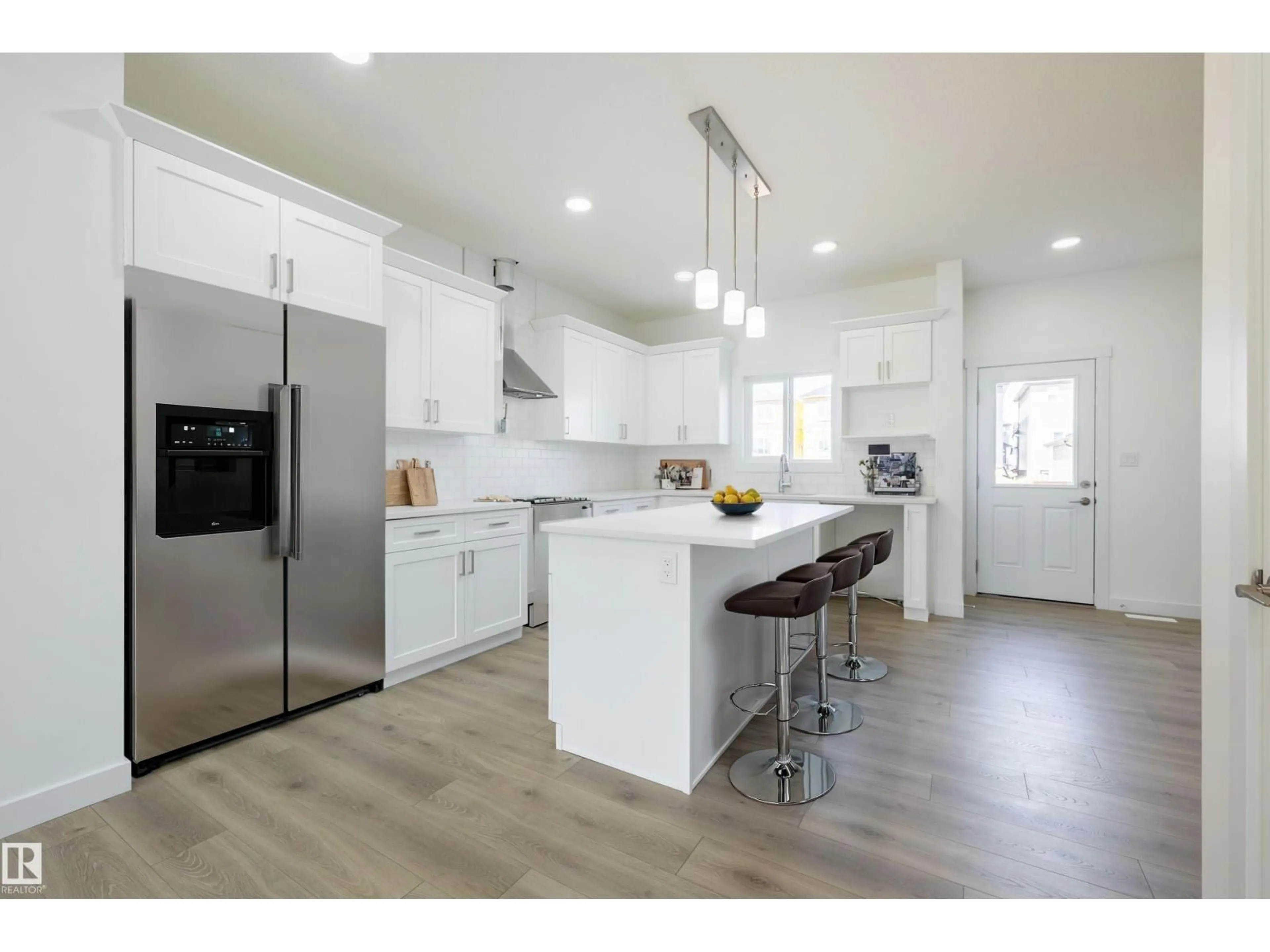 Open concept kitchen, wood/laminate floor for NW - 17716 69A ST, Edmonton Alberta T5Z0W6