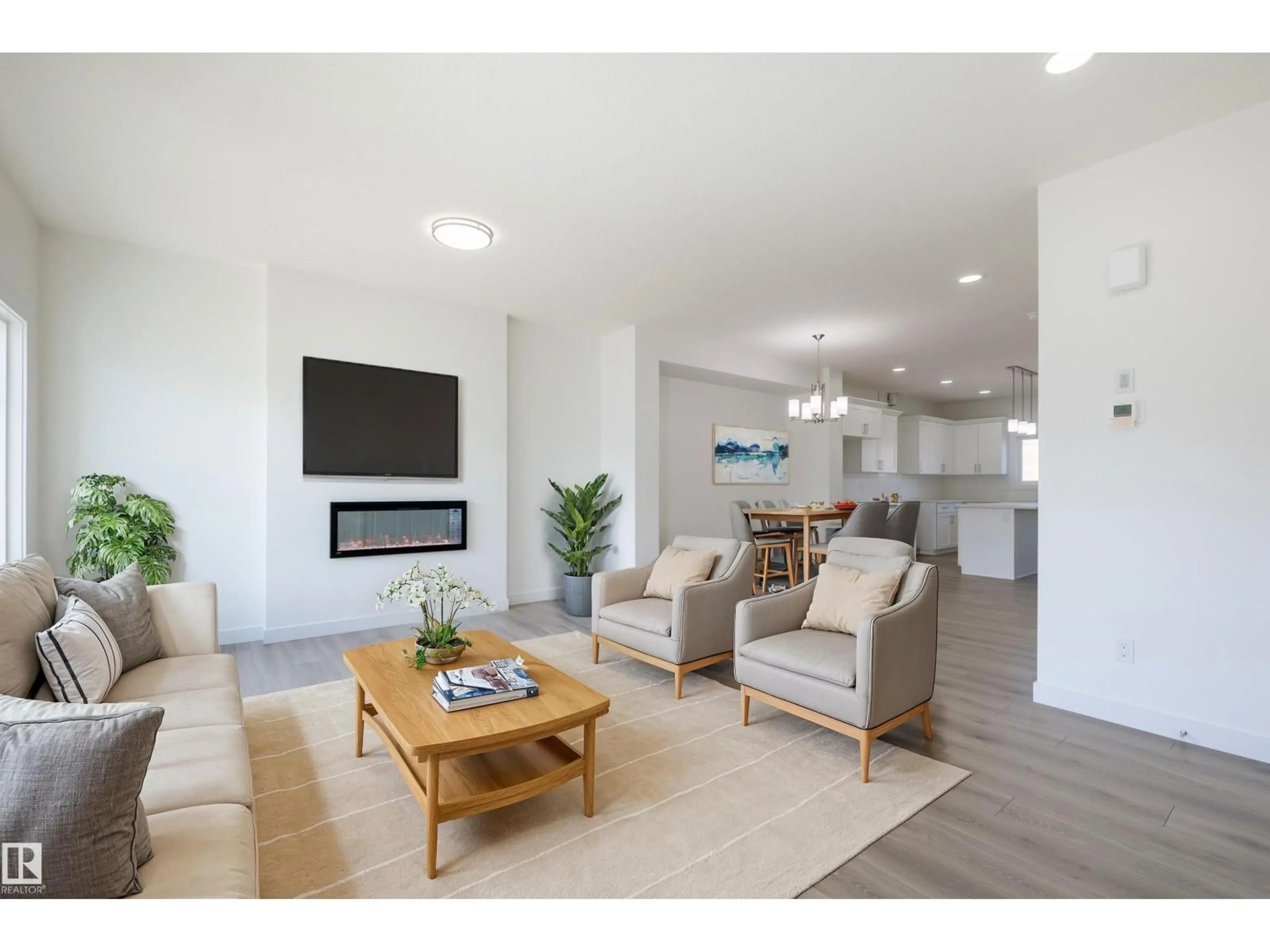 Living room with furniture, wood/laminate floor for NW - 17716 69A ST, Edmonton Alberta T5Z0W6
