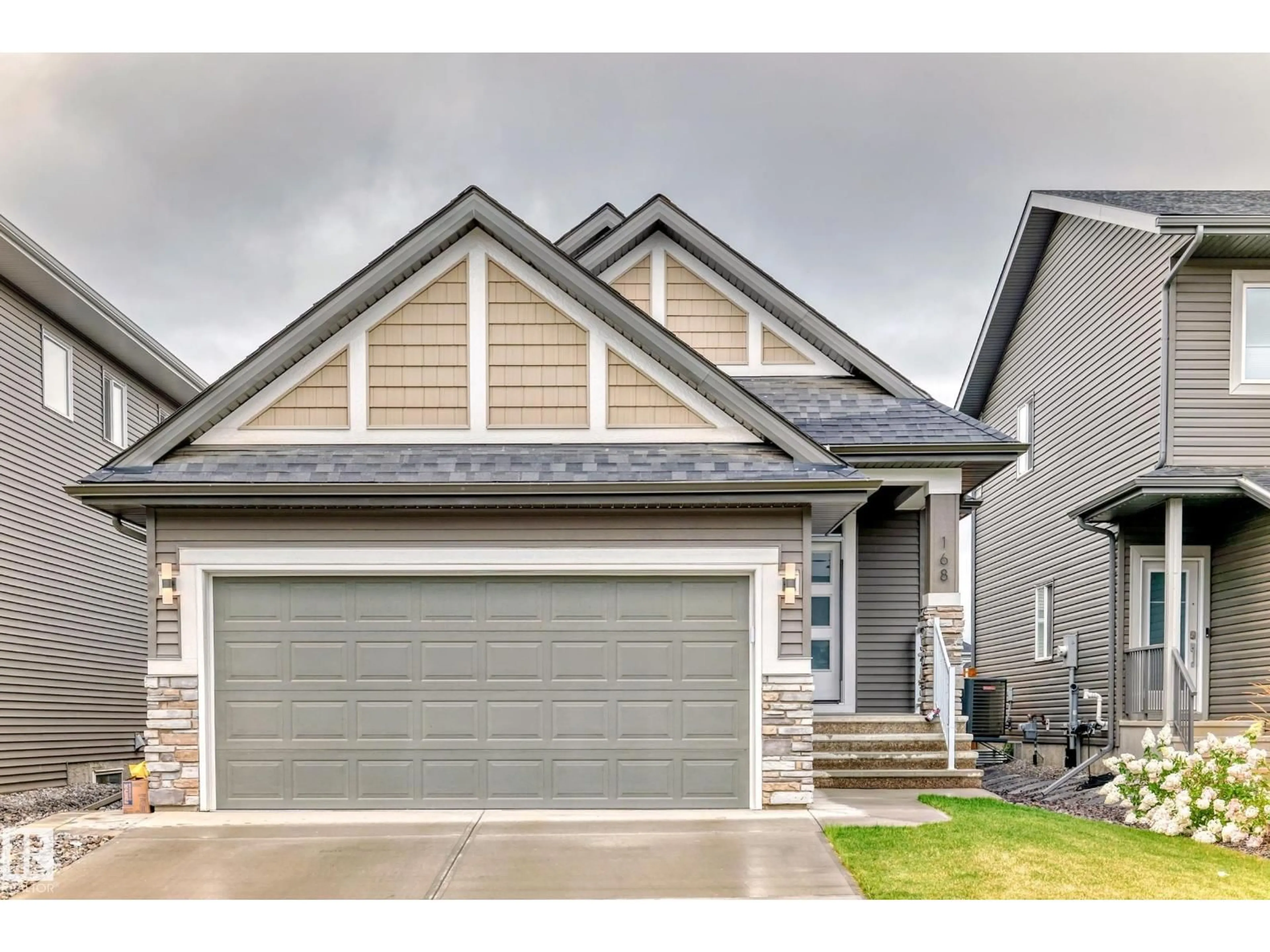 Home with vinyl exterior material, street for 168 REDWING WD, St. Albert Alberta T8N8A5