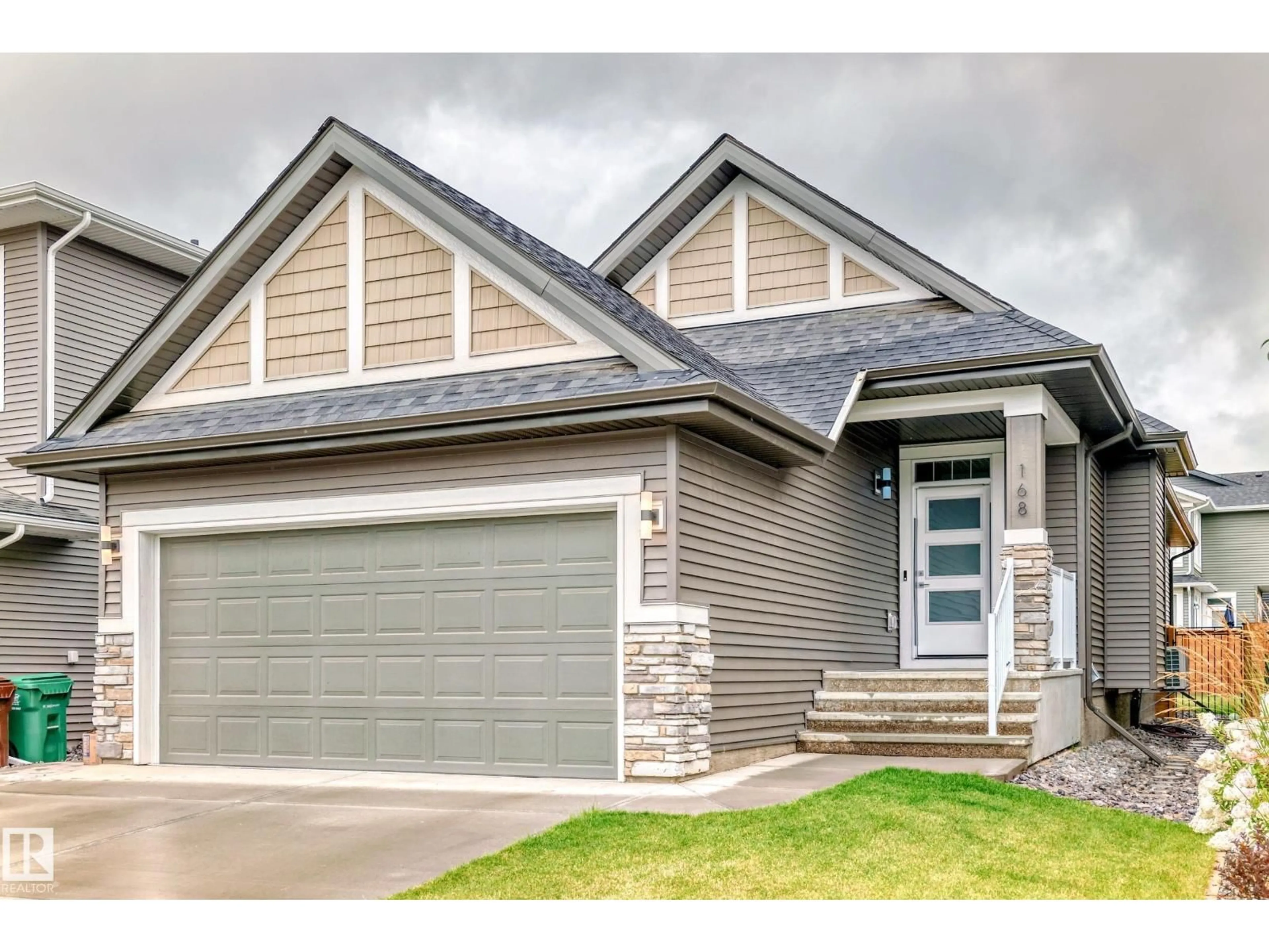 Home with vinyl exterior material, street for 168 REDWING WD, St. Albert Alberta T8N8A5
