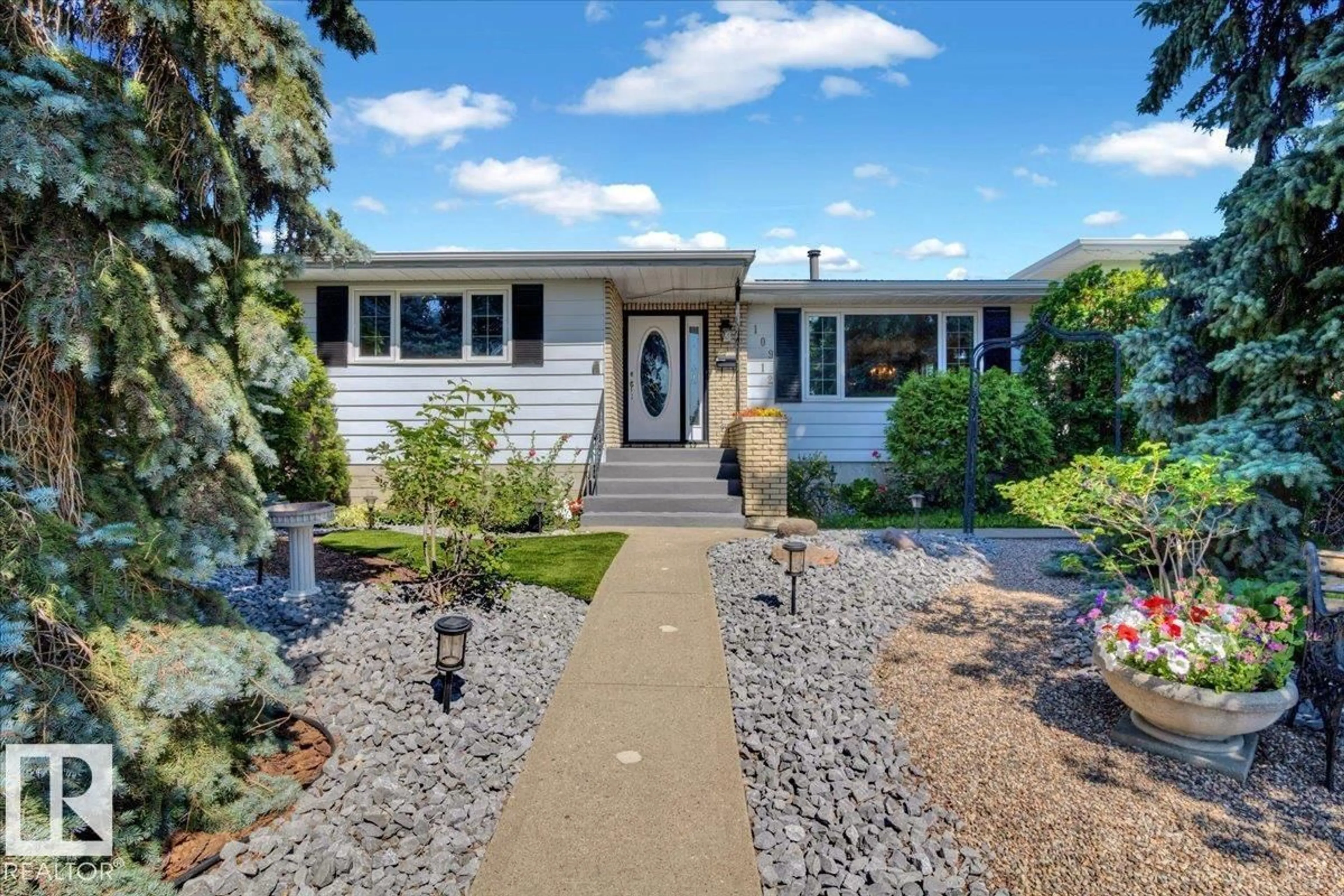 Home with vinyl exterior material, street for 10912 40A AV, Edmonton Alberta T6J0S9