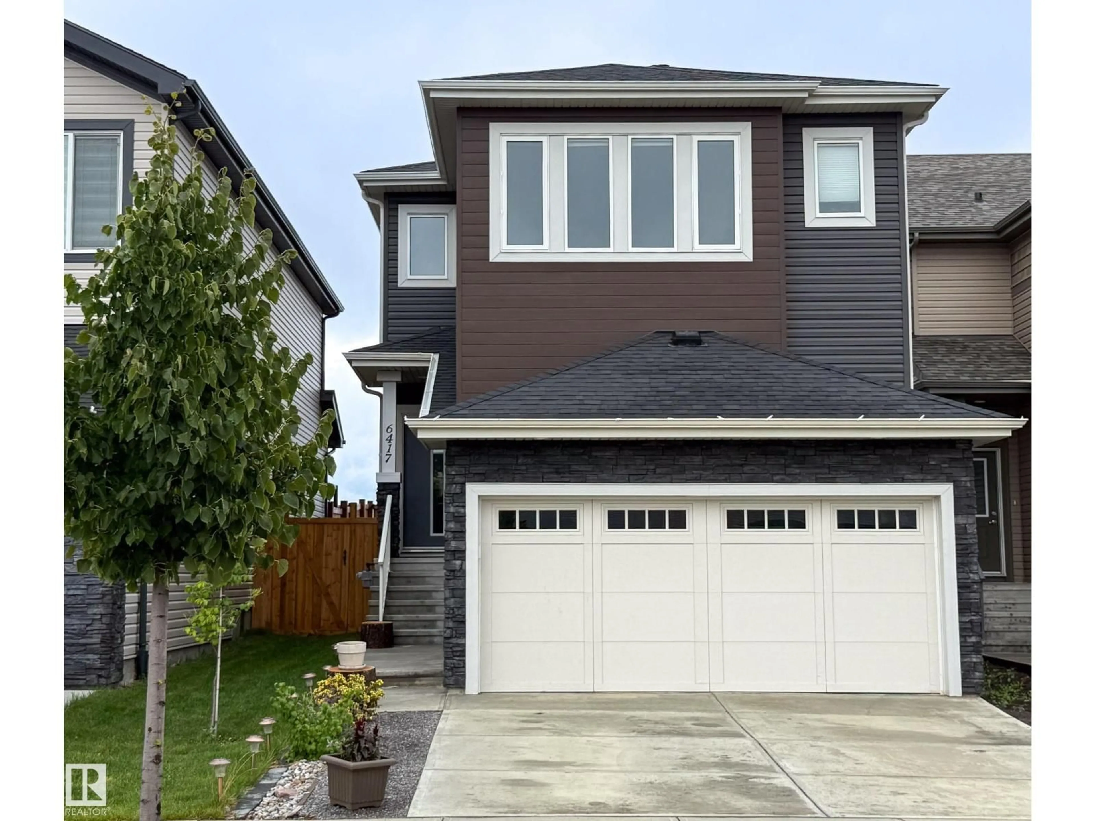 Home with vinyl exterior material, street for 6417 66 STREET, Beaumont Alberta T4X2P6