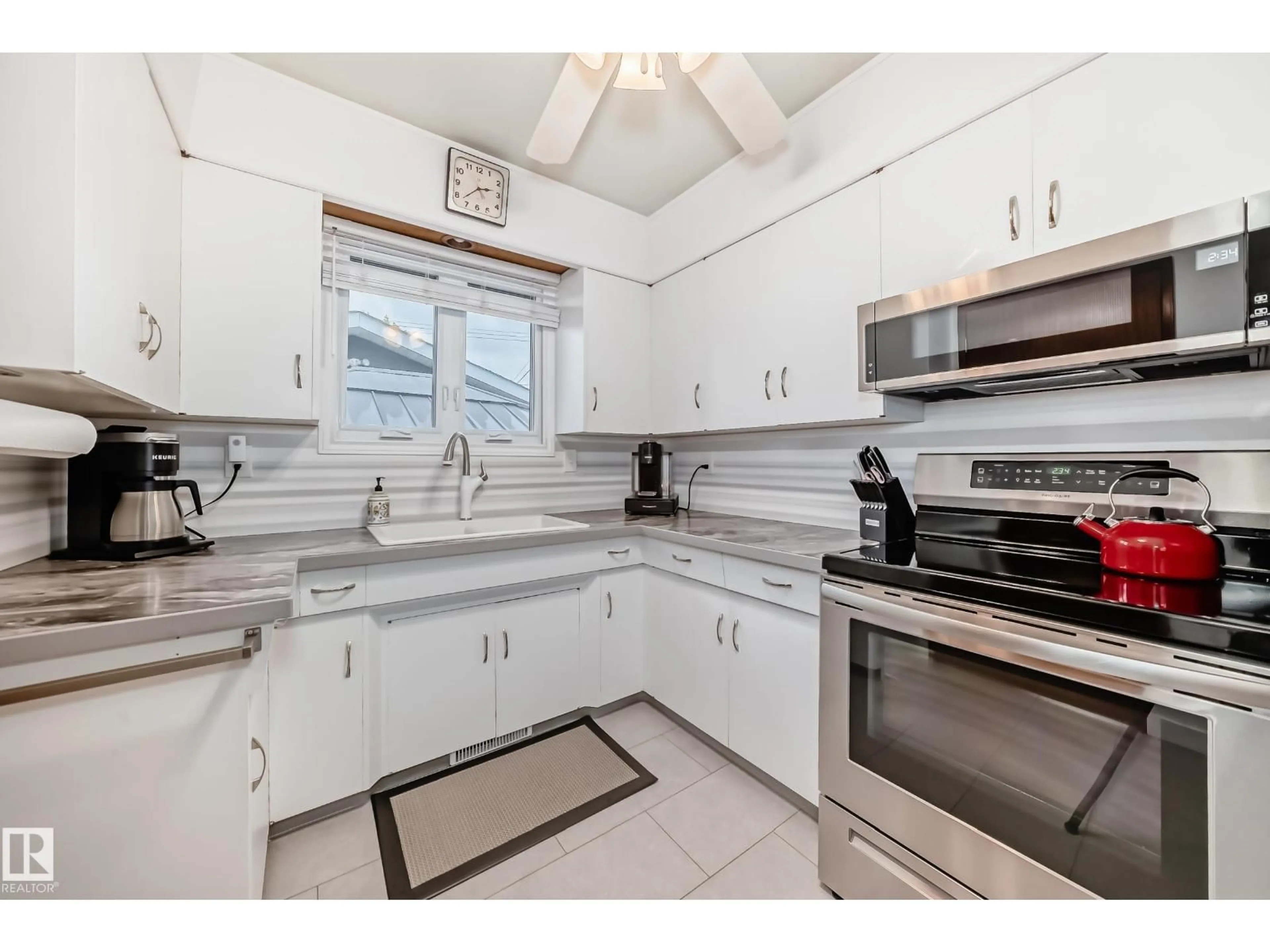 Standard kitchen, ceramic/tile floor for 7012 132 AV, Edmonton Alberta T5C2A6
