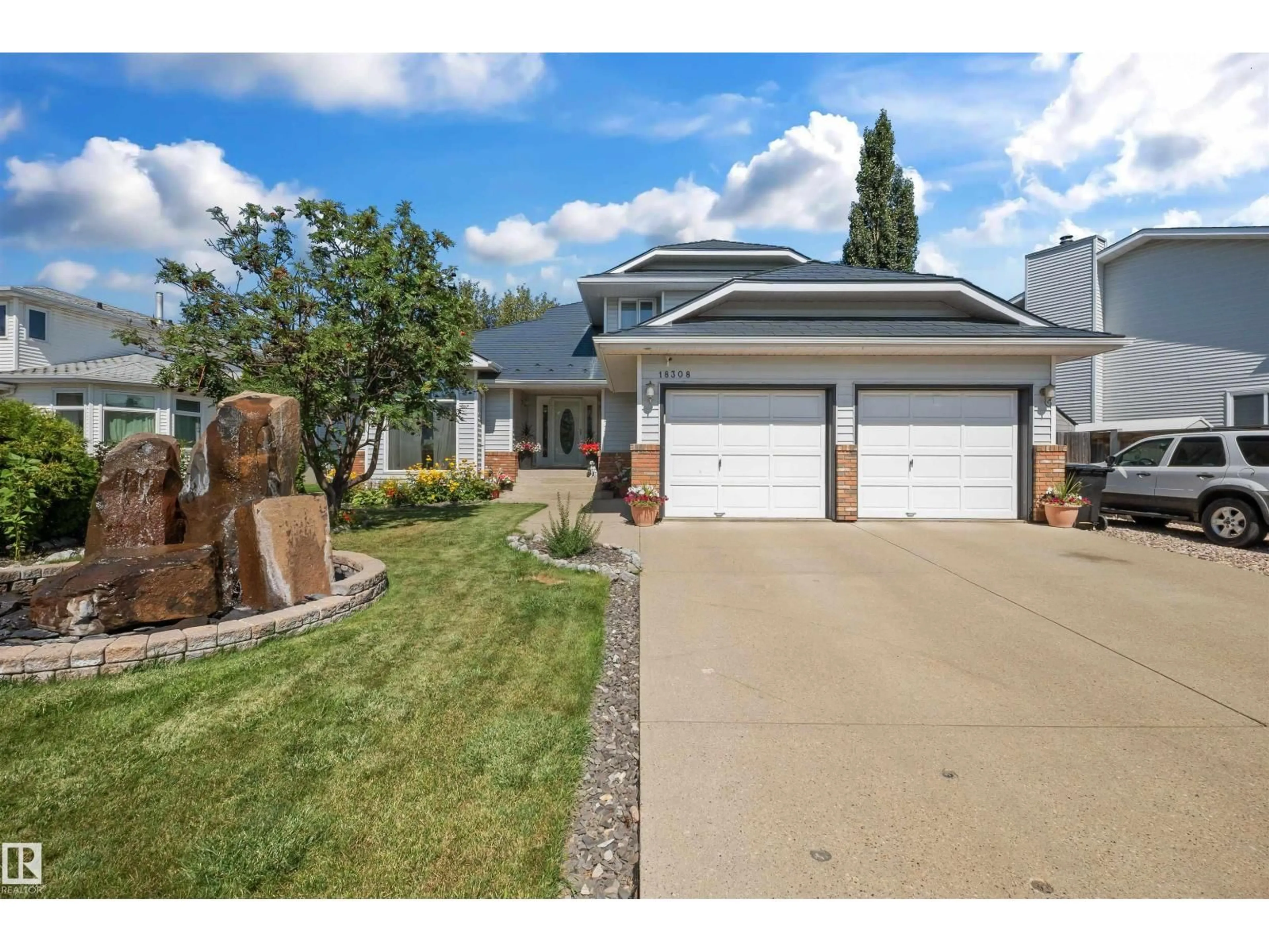 Home with vinyl exterior material, street for NW - 18308 60 AV, Edmonton Alberta T6M1T7