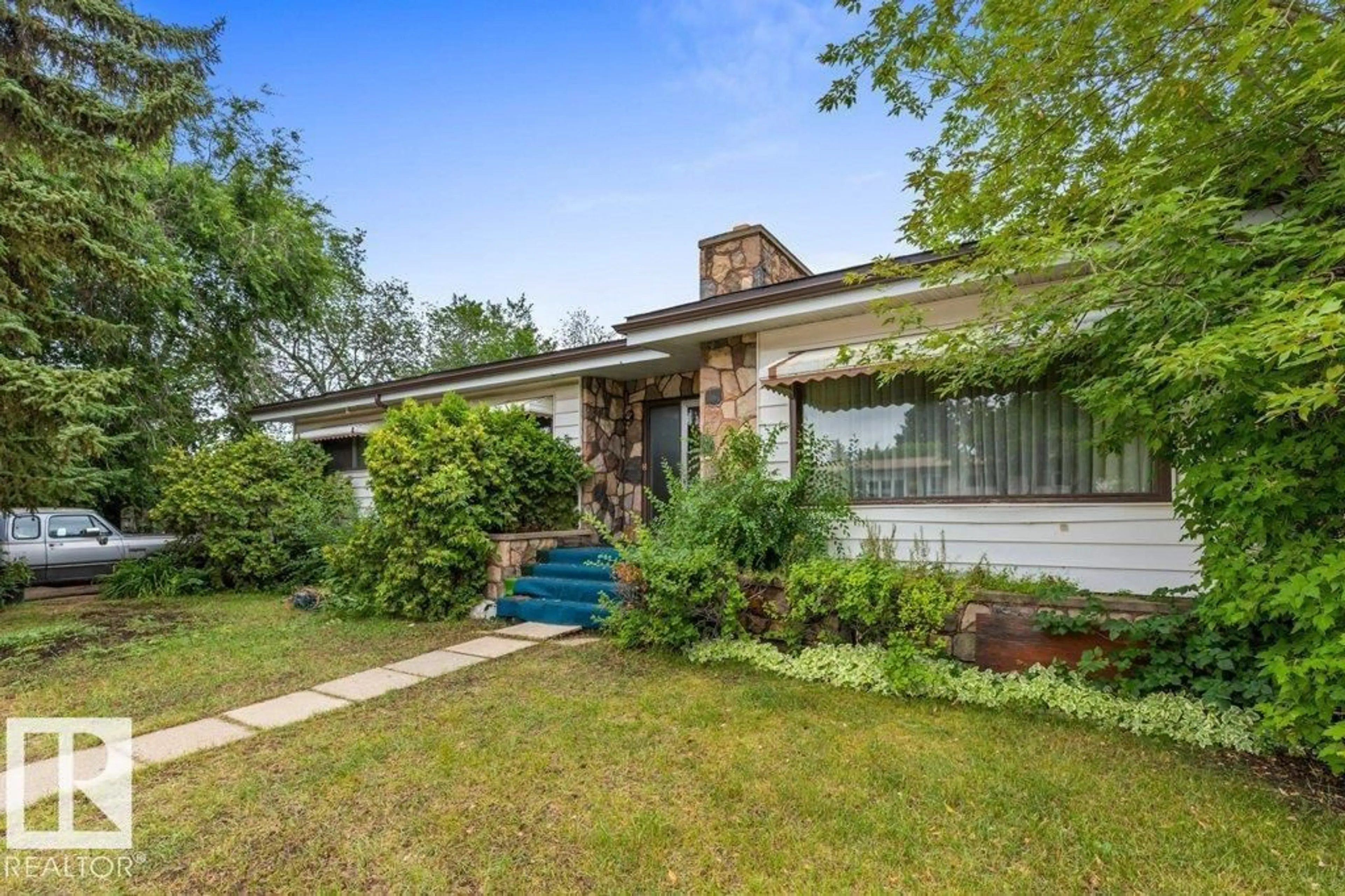 Home with brick exterior material, street for NW - 8603 71 ST, Edmonton Alberta T6B1X5