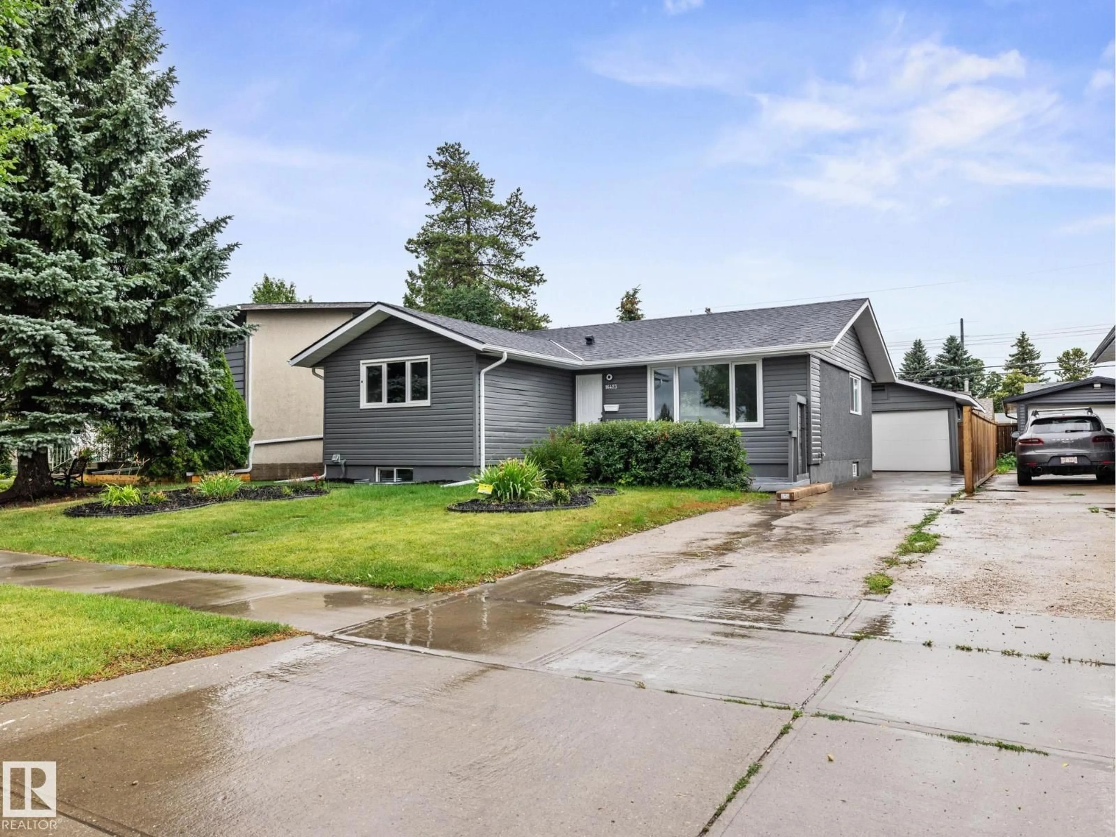Home with vinyl exterior material, street for 16423 80 AV, Edmonton Alberta T5R3M8
