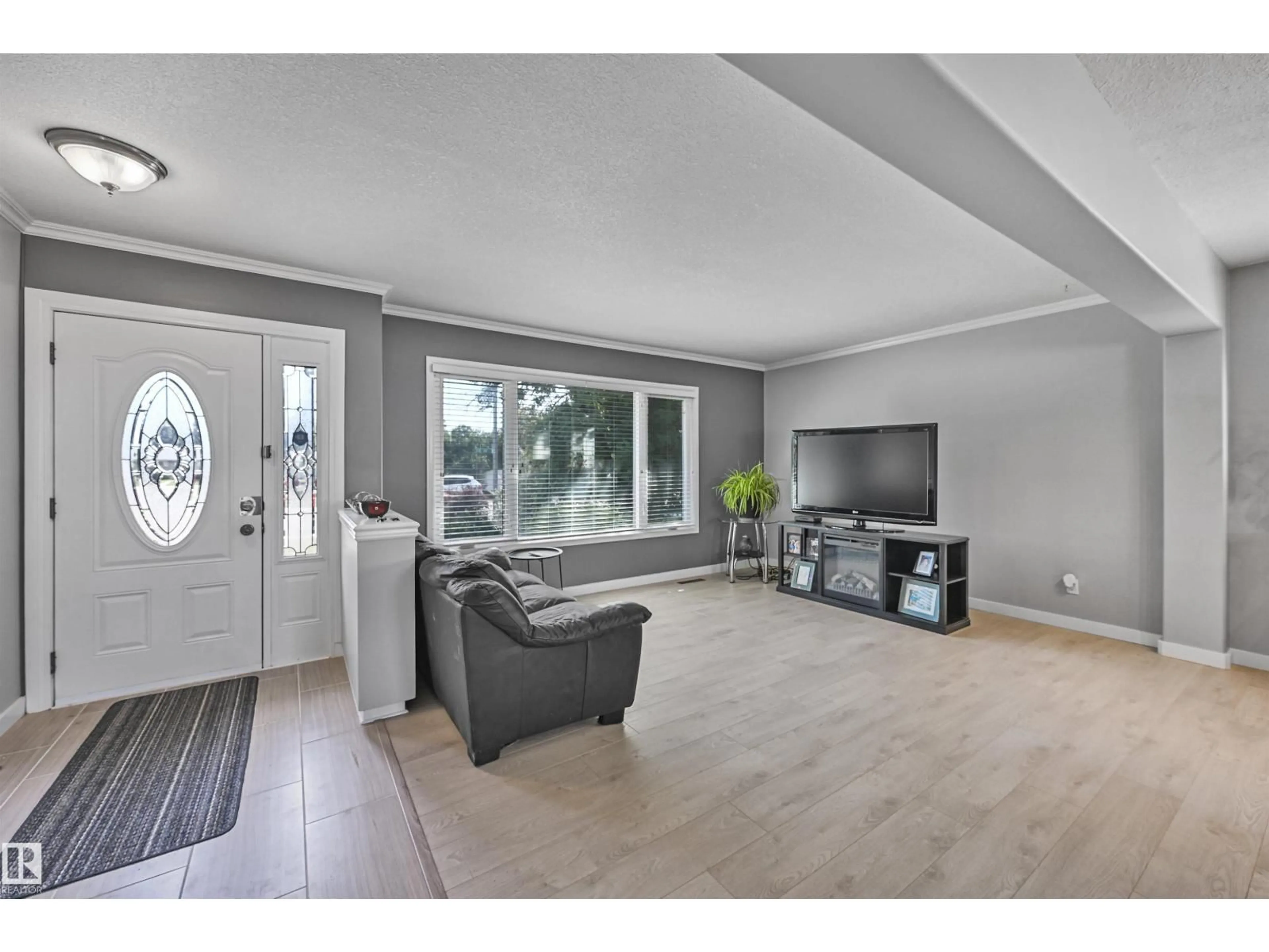 Living room with furniture, unknown for 10704 136 AV, Edmonton Alberta T5E1W4