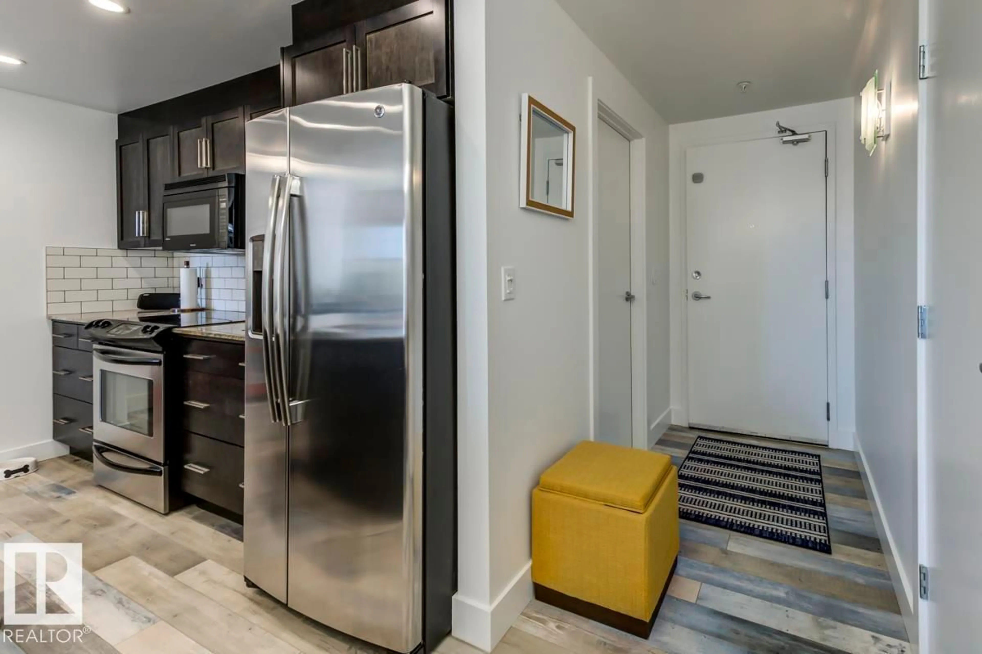 Open concept kitchen, ceramic/tile floor for #205 - 11933 JASPER AV, Edmonton Alberta T5K0P1