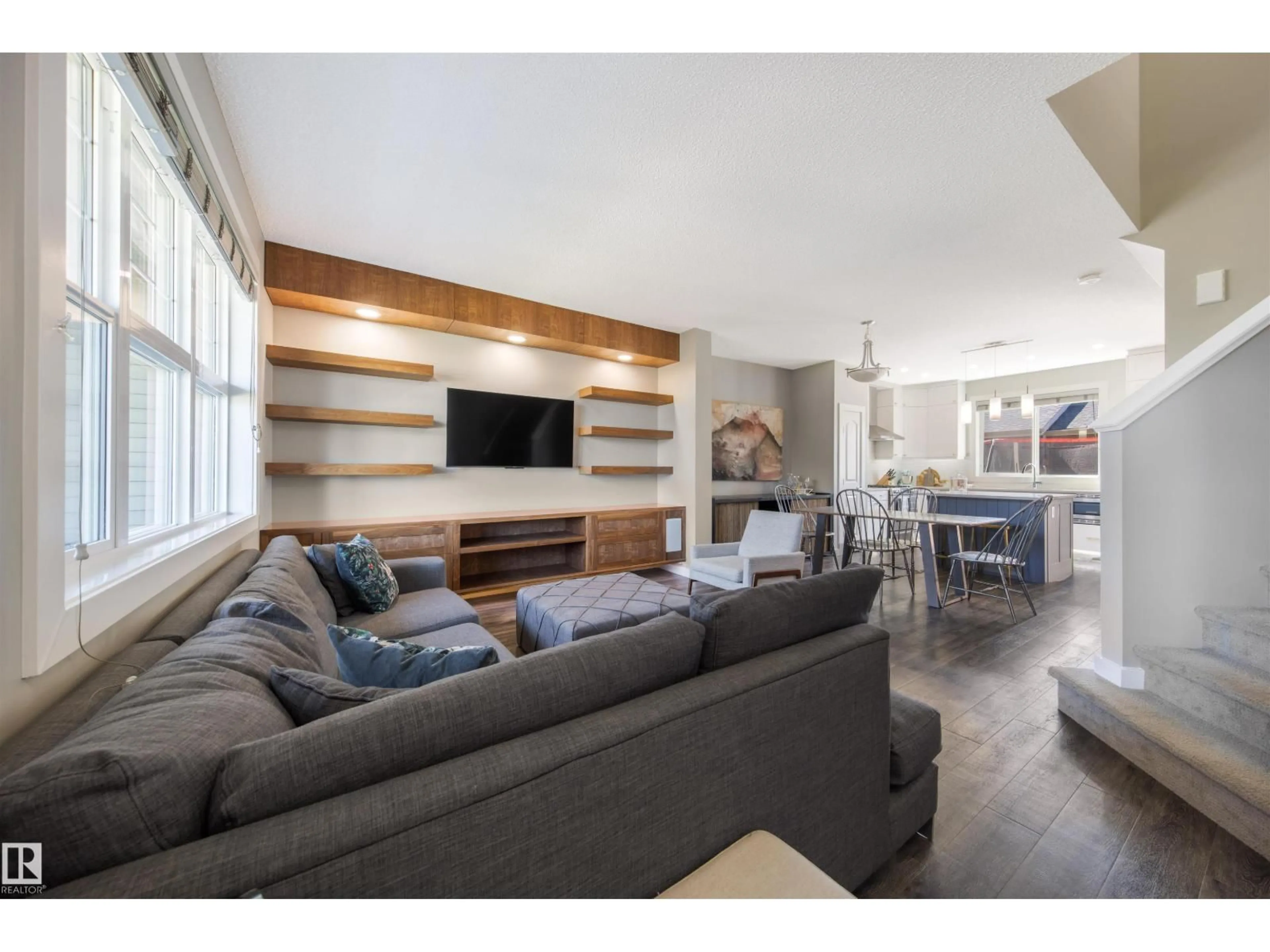 Living room with furniture, wood/laminate floor for 2233 GLENRIDDING BV, Edmonton Alberta T6W3E5