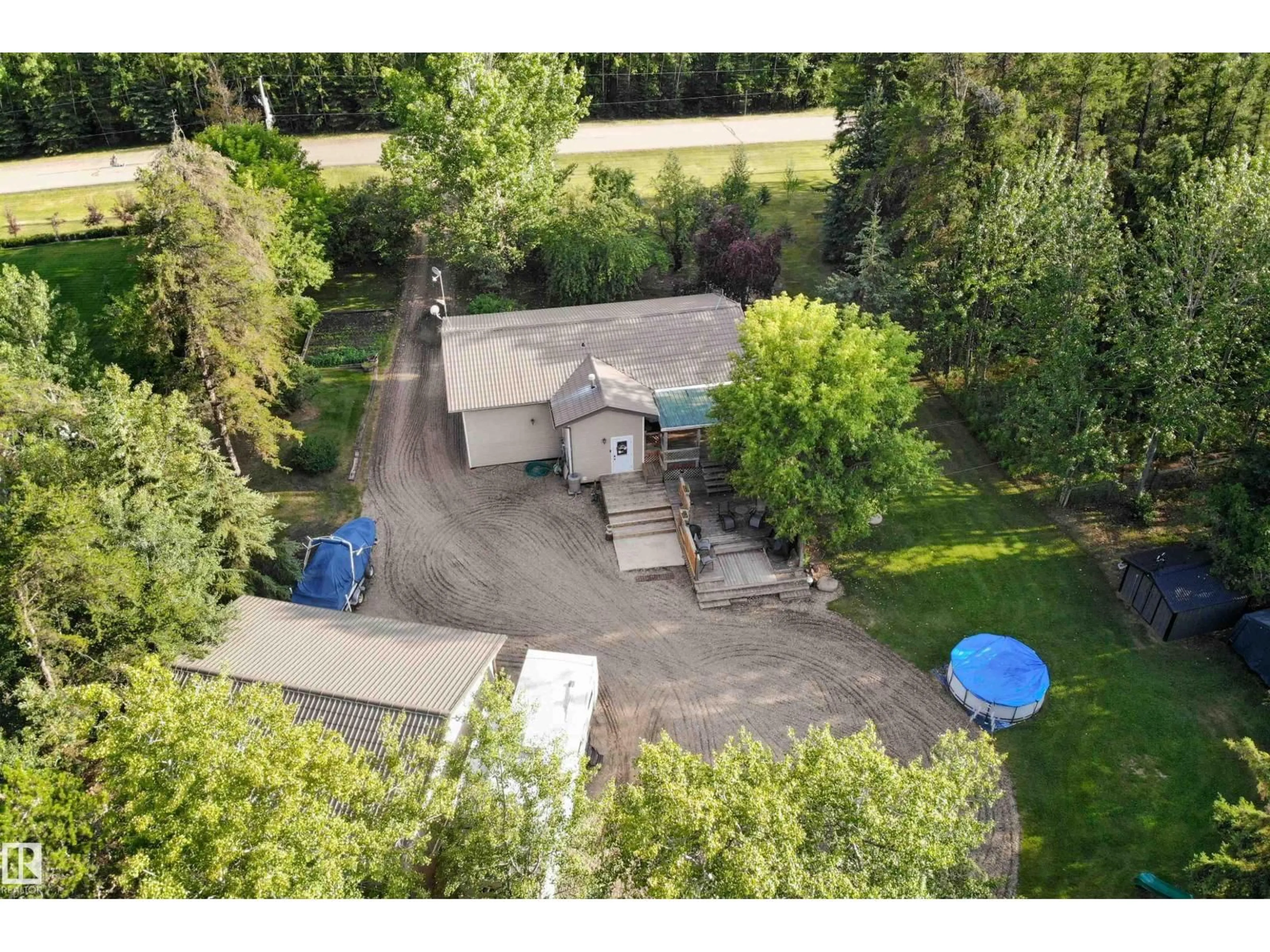 A pic from outside/outdoor area/front of a property/back of a property/a pic from drone, street for 2 61307 RG RD 470, Rural Bonnyville M.D. Alberta T9N2G7