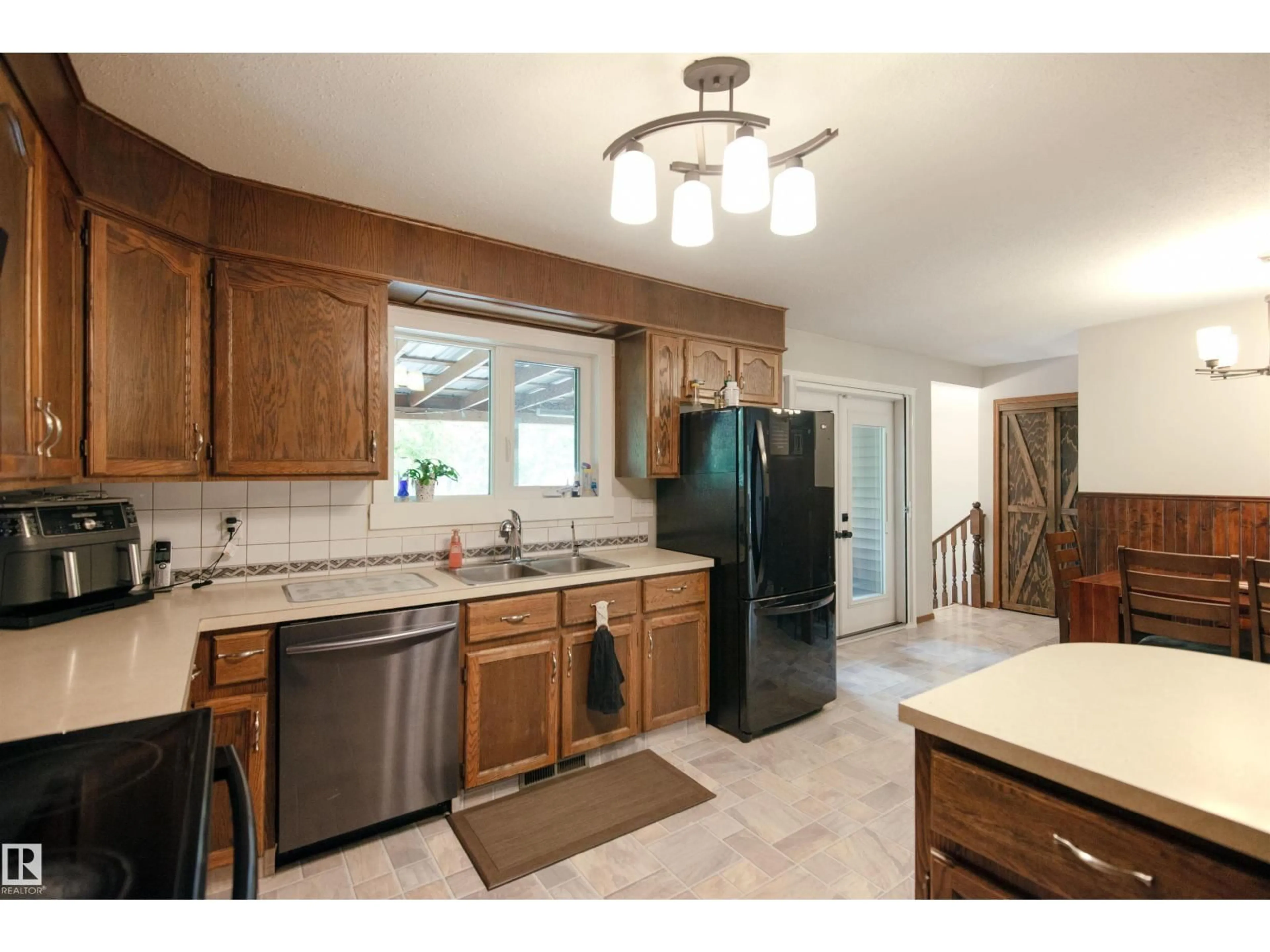 Open concept kitchen, ceramic/tile floor for 2 61307 RG RD 470, Rural Bonnyville M.D. Alberta T9N2G7