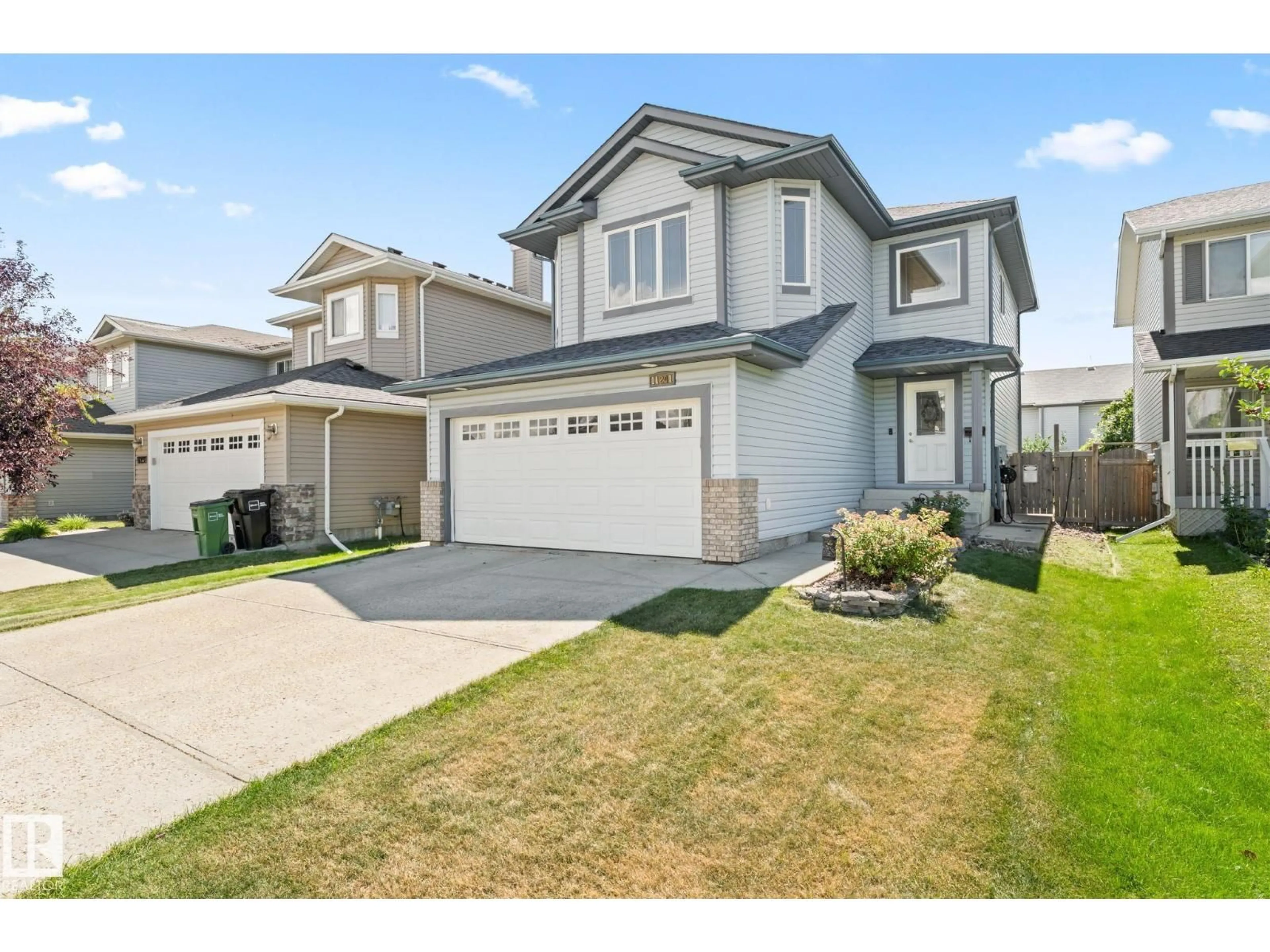 Home with vinyl exterior material, street for 11241 167A AV, Edmonton Alberta T5X0A8