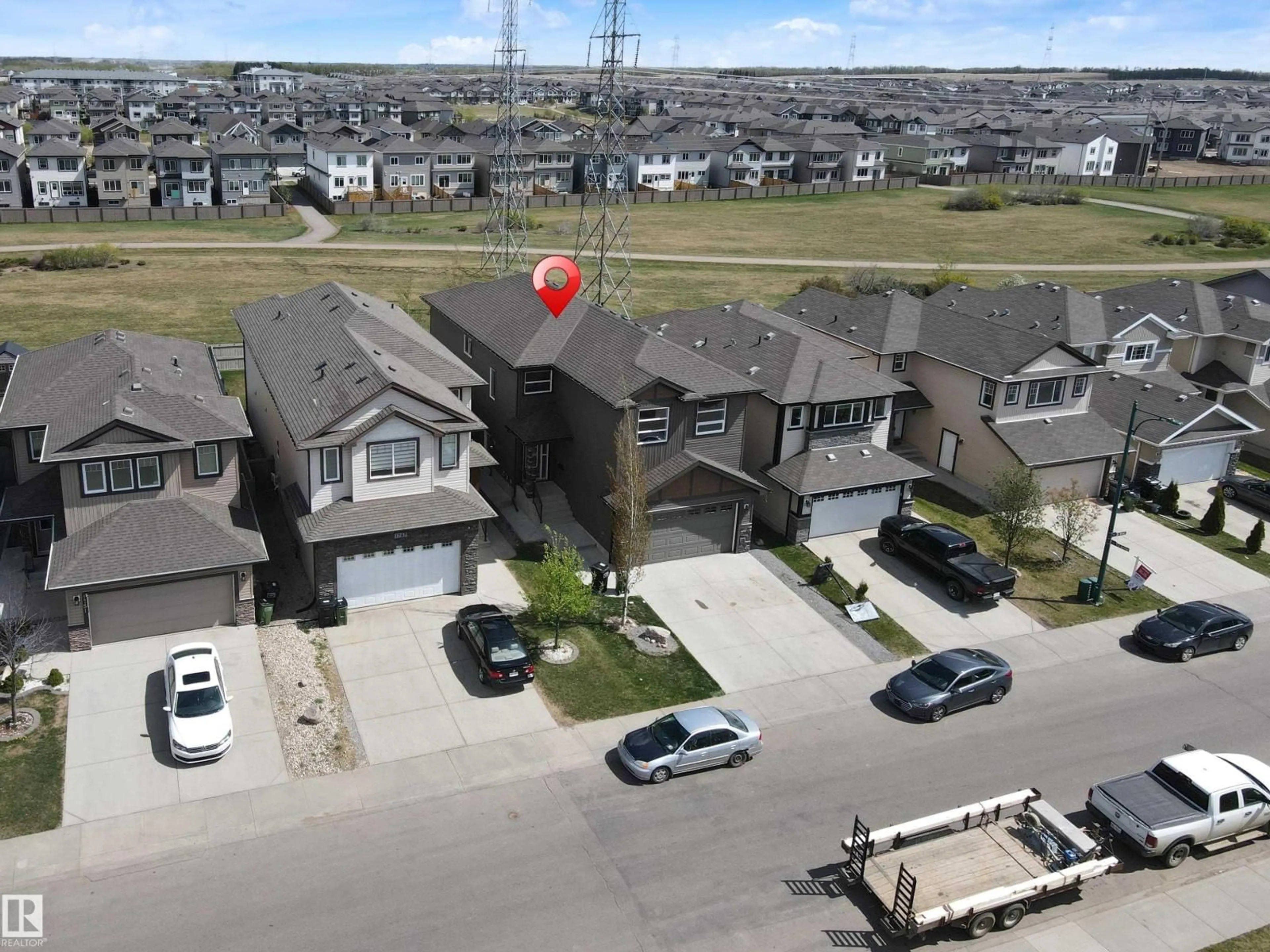 A pic from outside/outdoor area/front of a property/back of a property/a pic from drone, street for NW - 1743 28 ST, Edmonton Alberta T6T0Z6