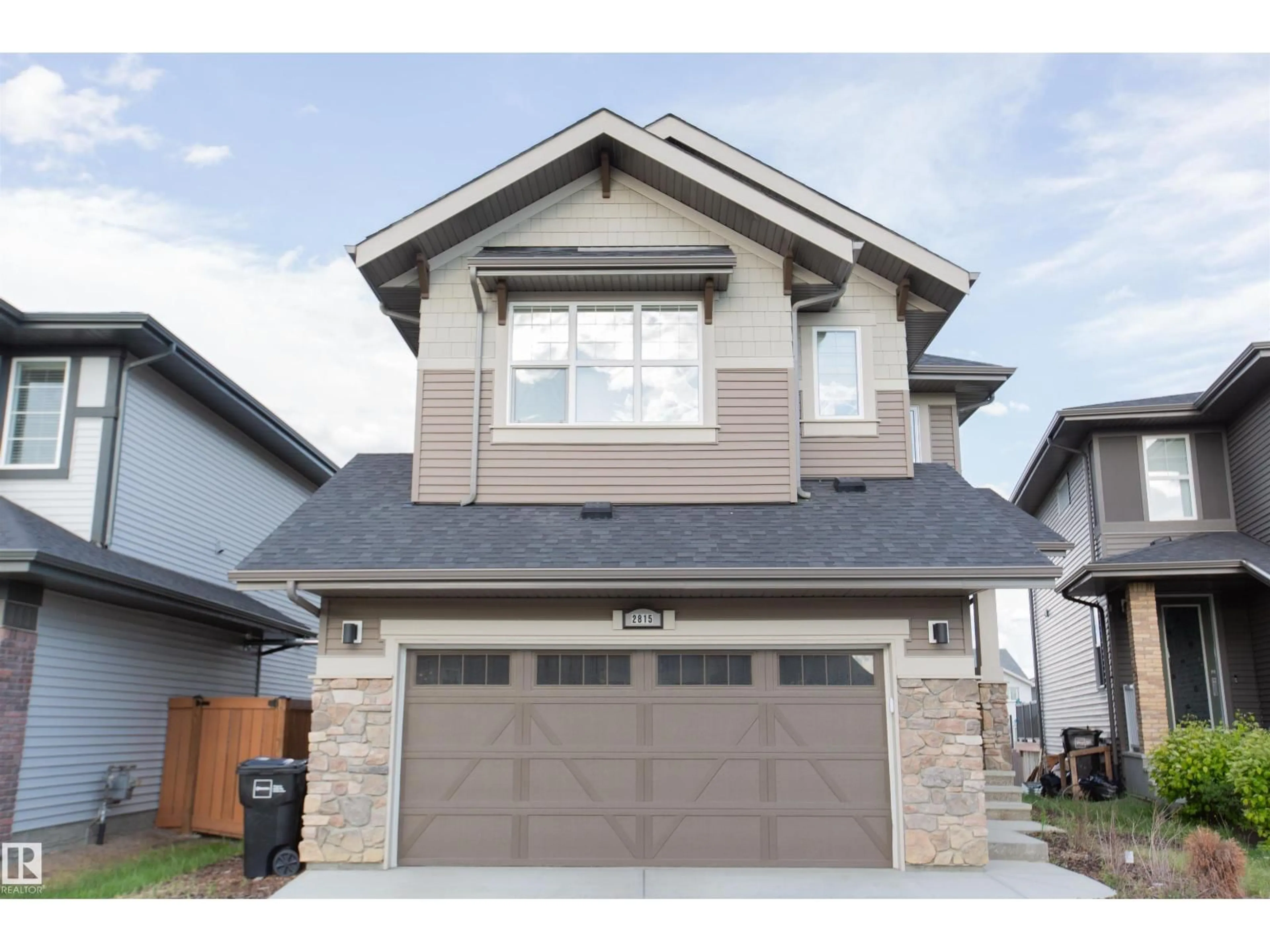 Home with vinyl exterior material, street for NW - 2815 200 ST, Edmonton Alberta T6M0W8