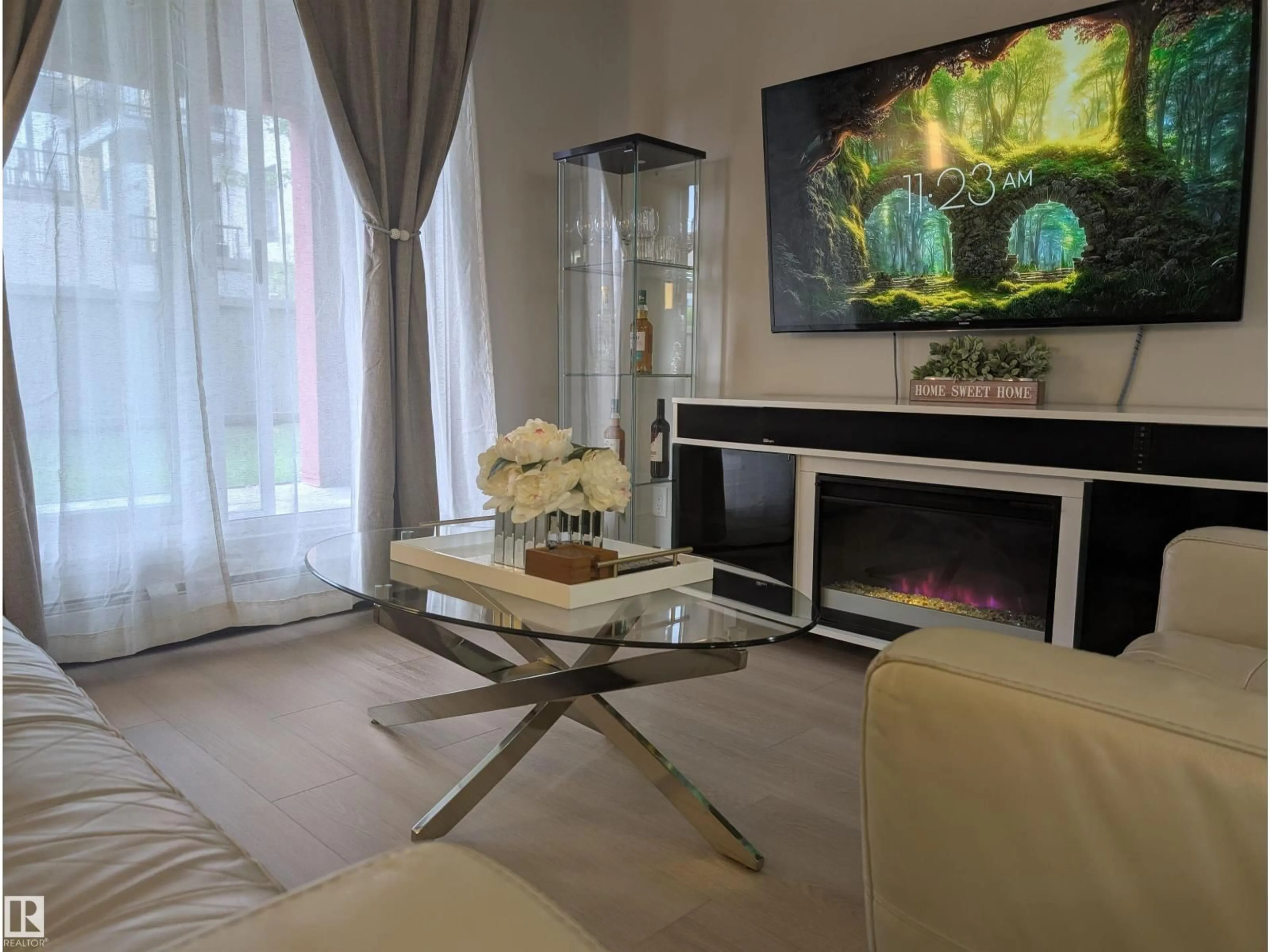 Living room with furniture, unknown for 127 5515 7 AV SW, Edmonton Alberta T6X2A8