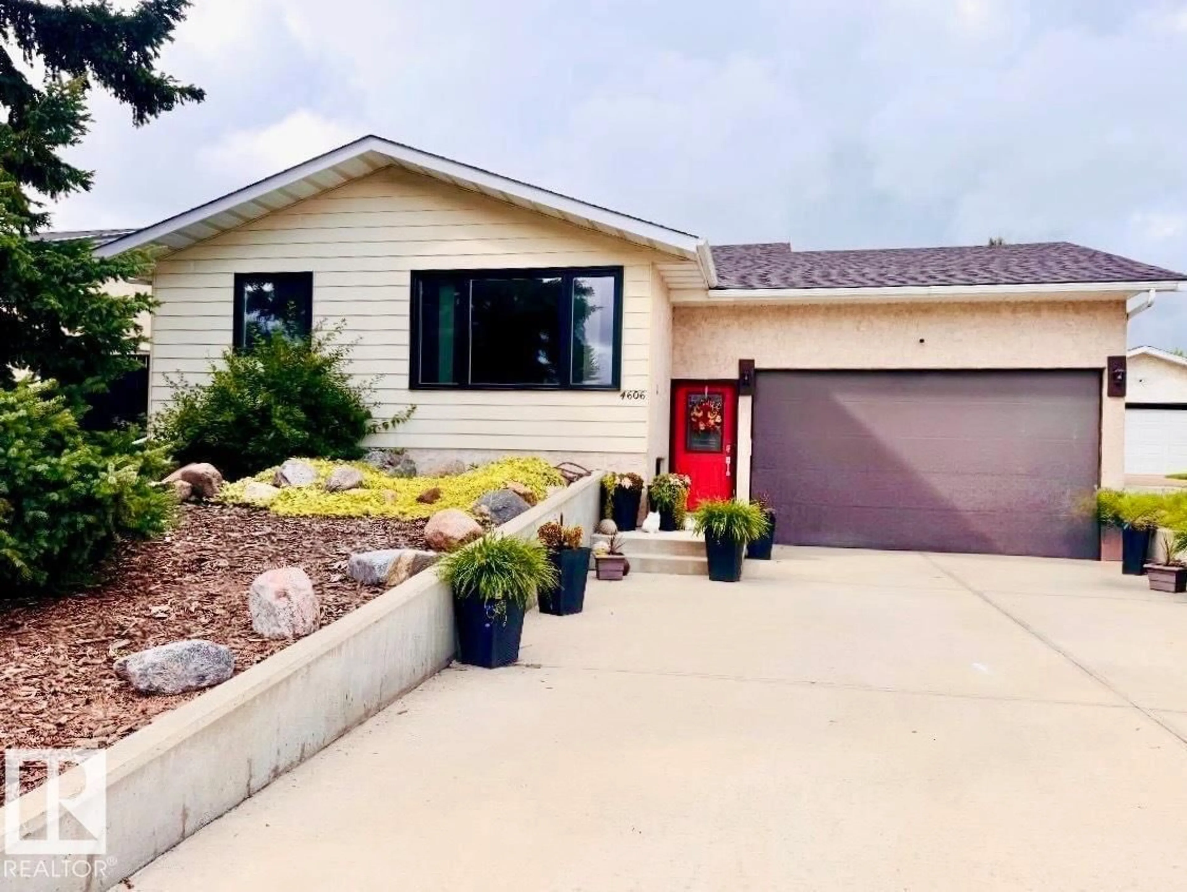 Home with vinyl exterior material, street for 4606 50A AV, Beaumont Alberta T4X1J2