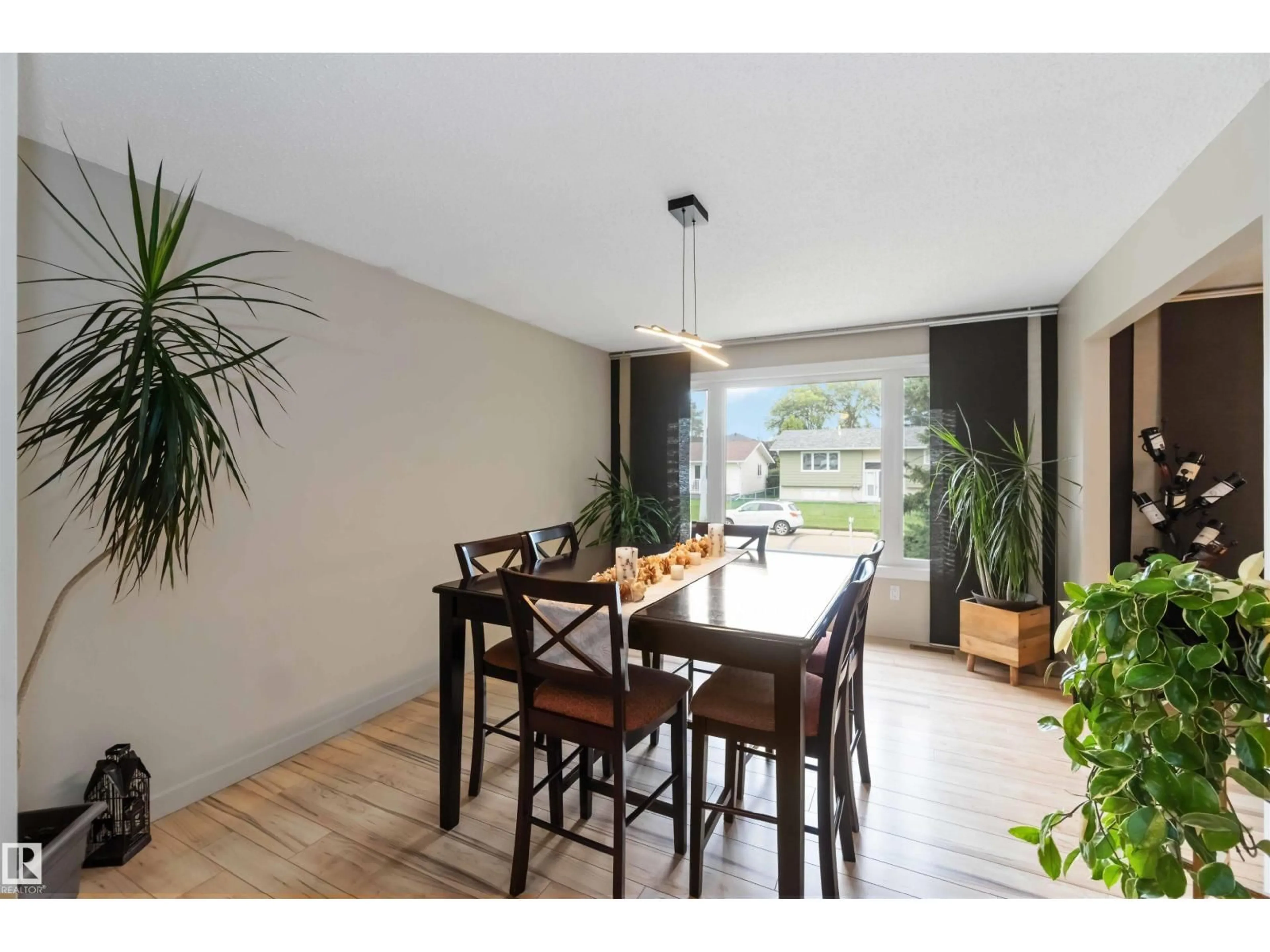 Dining room, wood/laminate floor for 4606 50A AV, Beaumont Alberta T4X1J2