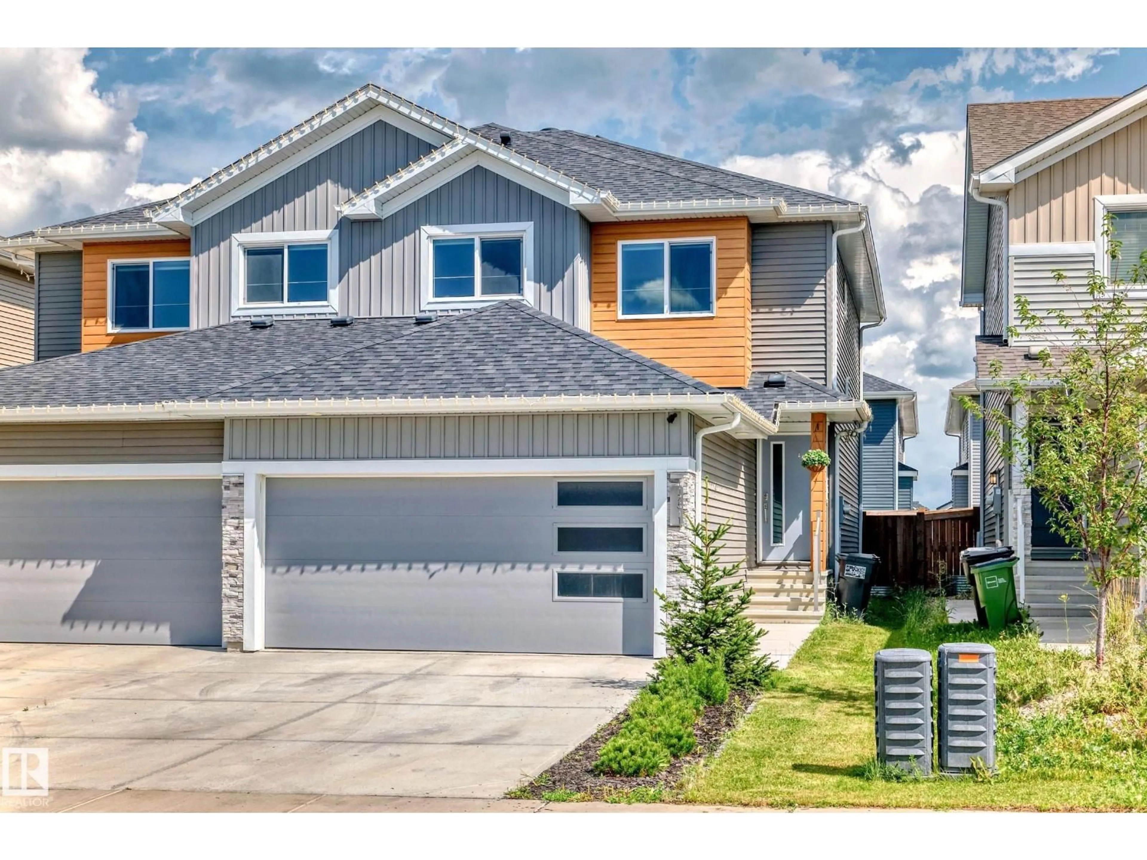 Home with vinyl exterior material, street for 17511 65 ST, Edmonton Alberta T5Y4A7