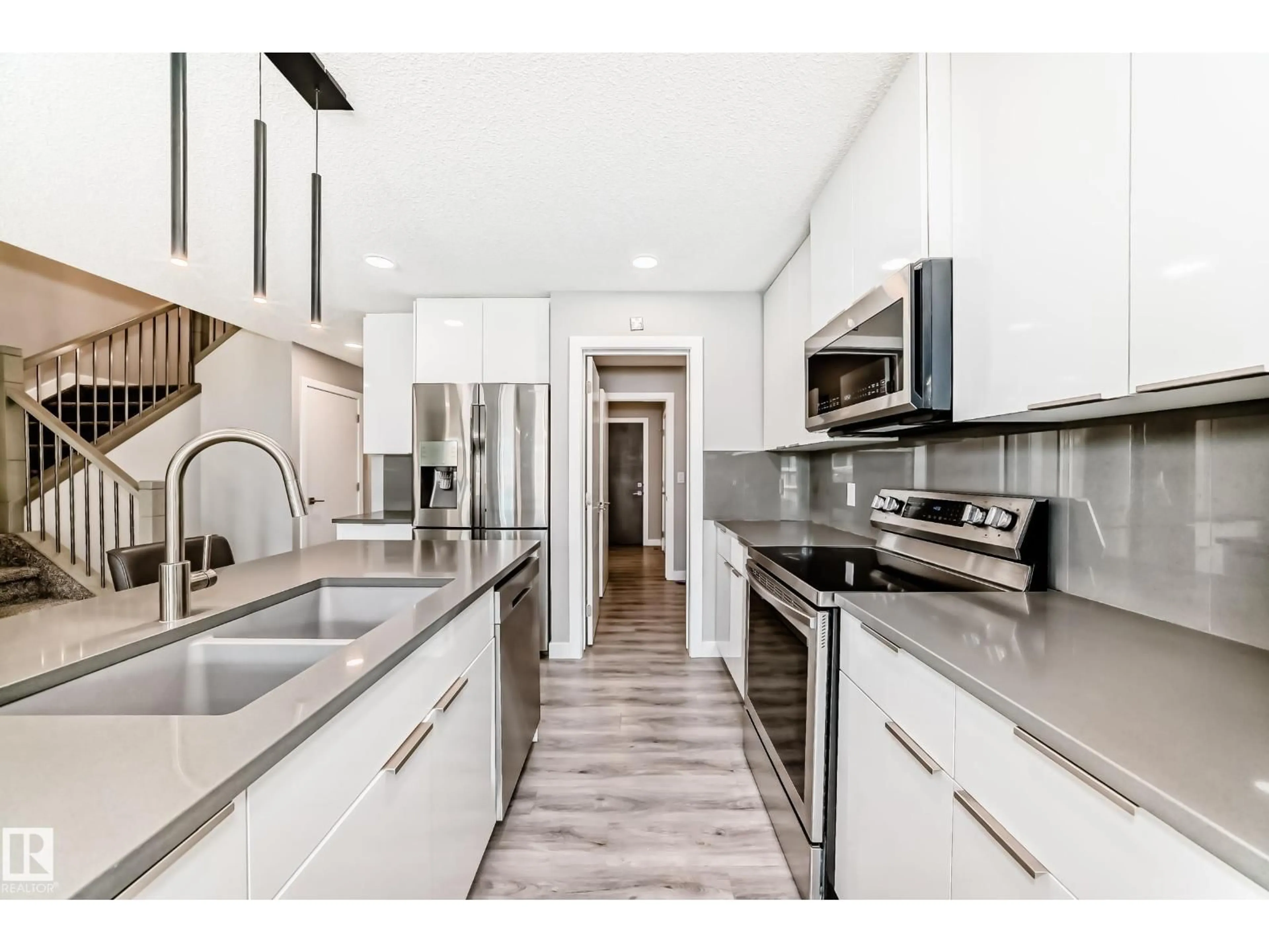 Open concept kitchen, ceramic/tile floor for 17511 65 ST, Edmonton Alberta T5Y4A7